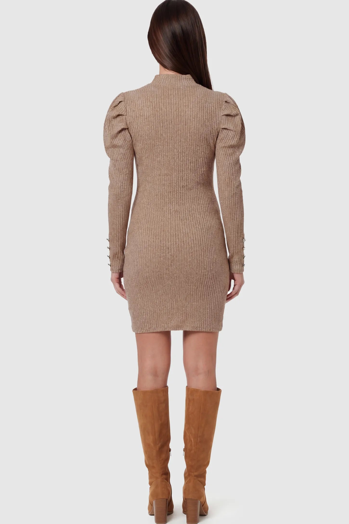 Ribbed Knit Puff Sleeve Bodycon Maternity Dress Ribbed Knit Puff Sleeve Bodycon Maternity Dress in Brown featuring a puff sleeve and textured fabric on a pregnant model showing back.