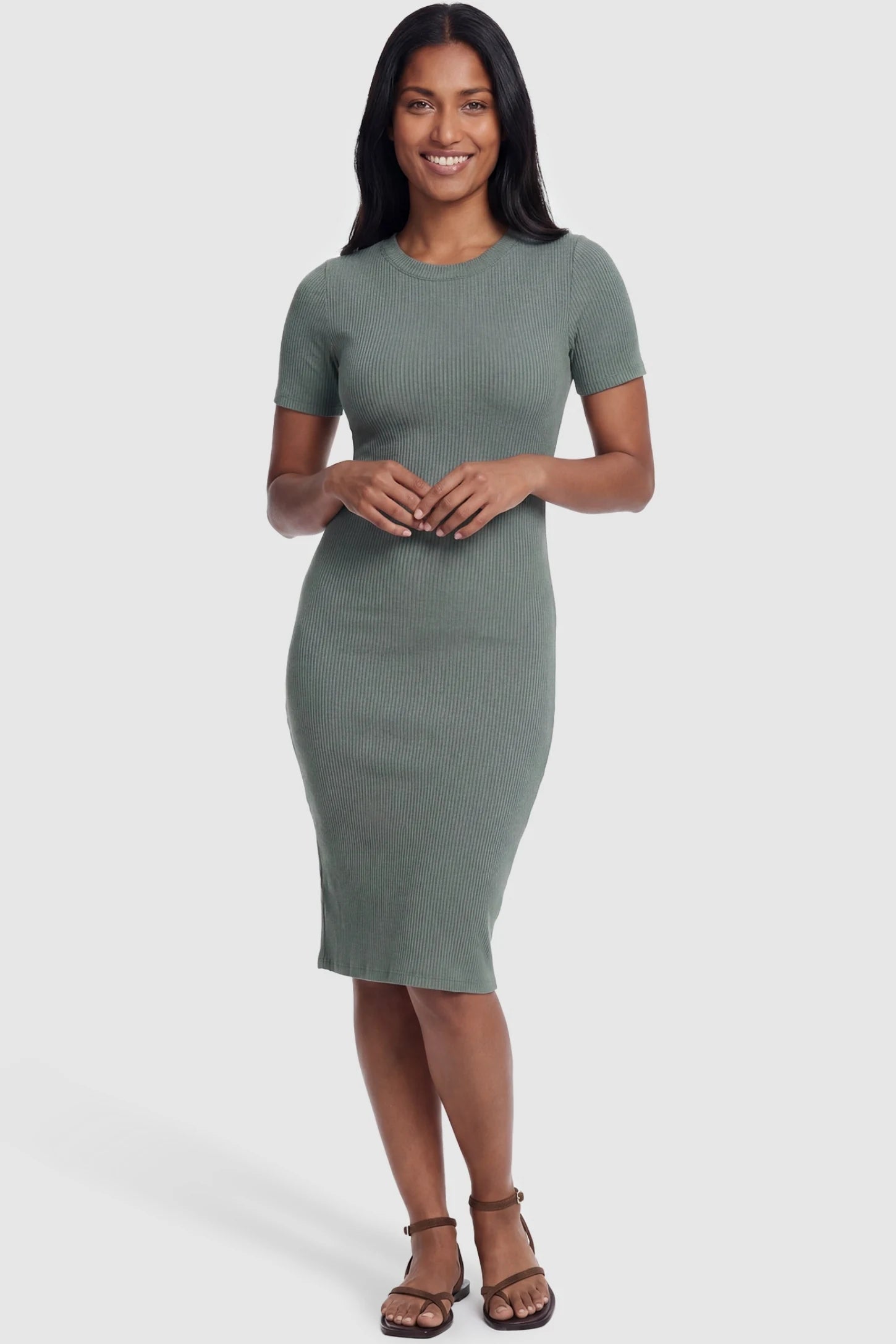 Ribbed Knit Short Sleeve Midi Maternity Dress Ribbed Knit Short Sleeve Midi Maternity Dress in Green featuring a sleek ribbed knit that transitions seamlessly postpartum on a non-pregnant model, front view.