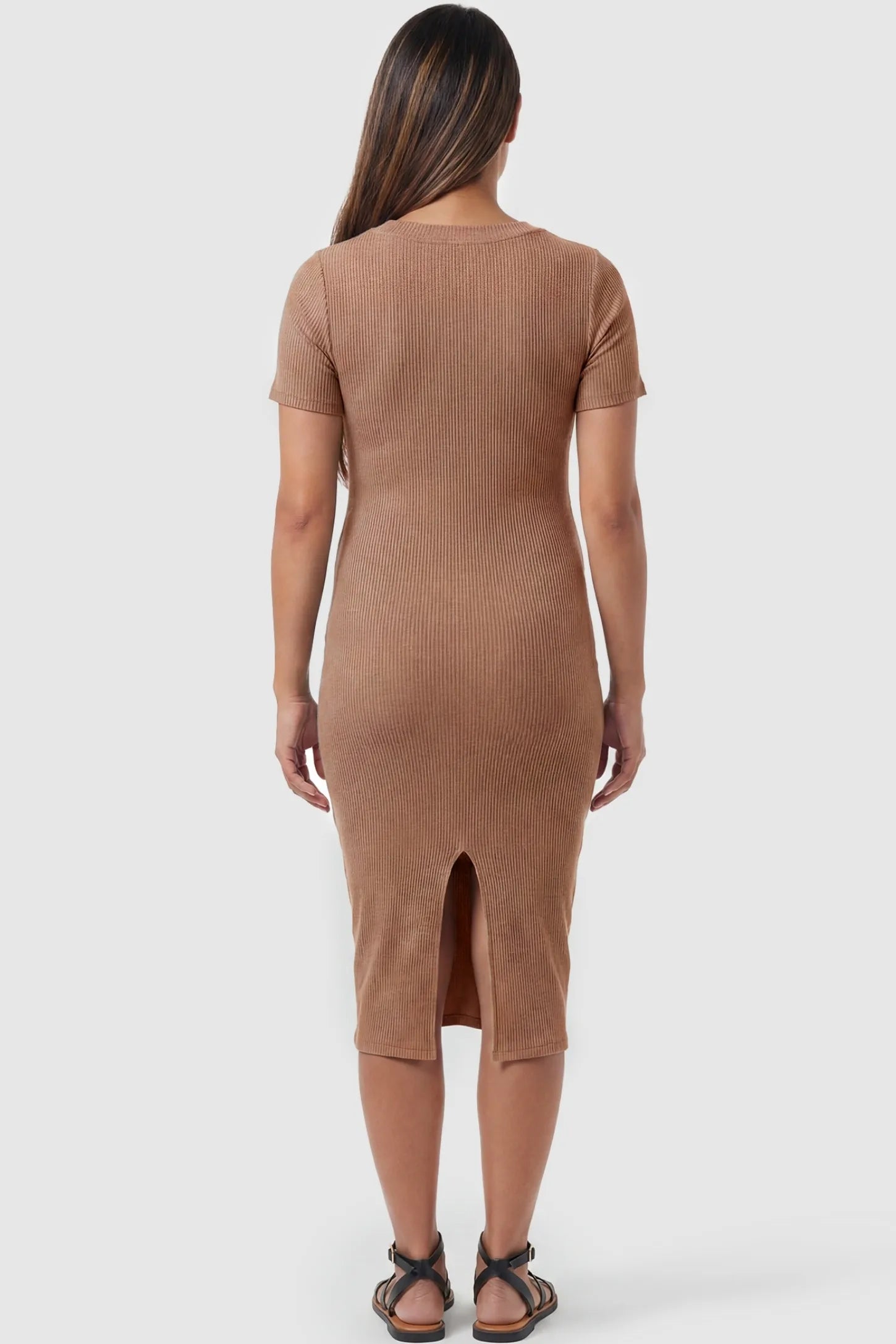 Ribbed Knit Short Sleeve Midi Maternity Dress Ribbed Knit Short Sleeve Midi Maternity Dress in Khaki featuring a center back slit on a pregnant model, back view.