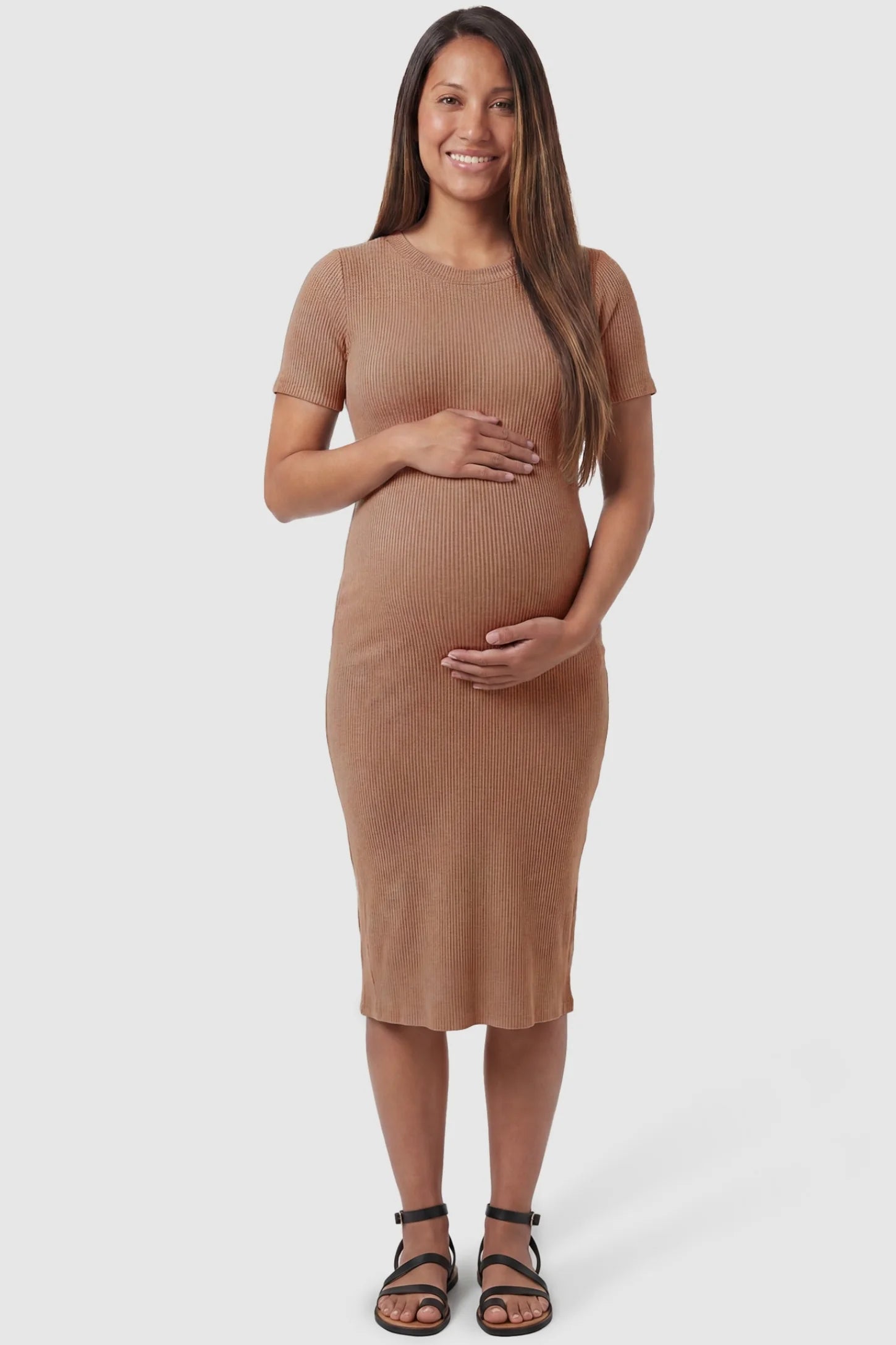 Ribbed Knit Short Sleeve Midi Maternity Dress Ribbed Knit Short Sleeve Midi Maternity Dress in Khaki featuring a form-fitting ribbed knit fabric on a pregnant model, front view.