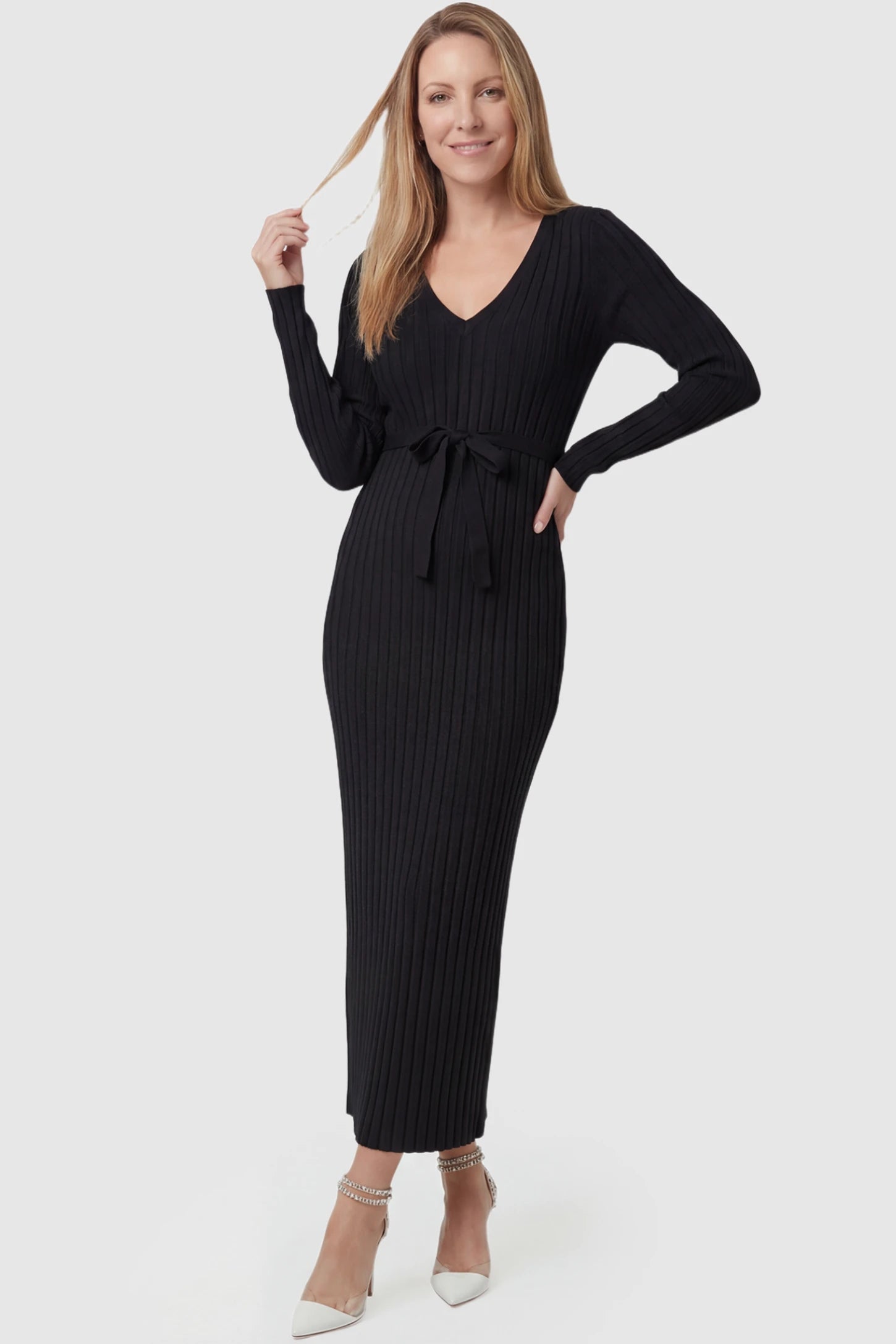 Ribbed Knit V-Neck Tie Waist Maternity Maxi Dress Ribbed Knit V-Neck Maternity Maxi Dress in Black featuring a tie waist and long sleeves on a postpartum model, front view.