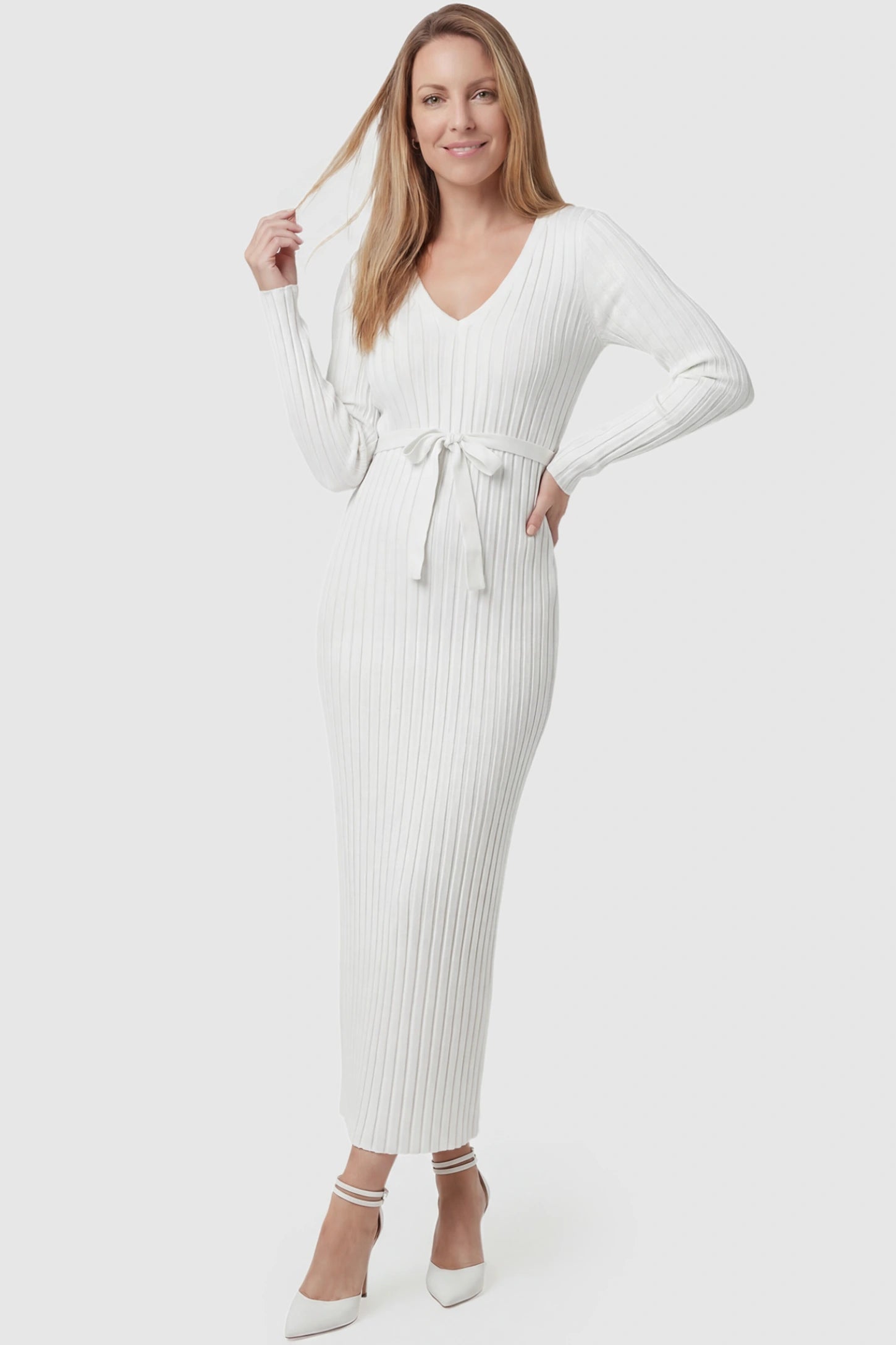 Ribbed Knit V-Neck Tie Waist Maternity Maxi Dress Ribbed Knit V-Neck Maternity Maxi Dress in White featuring a tie waist and long sleeves on a postpartum model, front view.