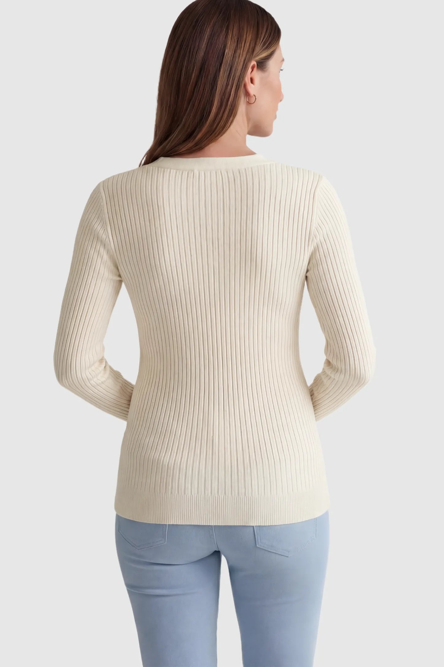 Ribbed Long Sleeve Maternity Henley Top Ribbed Maternity Henley Top in Apricot featuring a functional button placket and vertical rib knit on a pregnant model showing back.