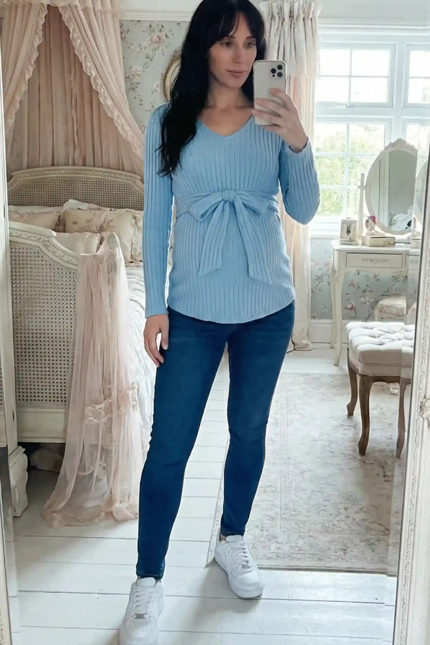 Ribbed Front Tie-Waist Long Sleeve Maternity Top Ribbed Front Tie-Waist Long Sleeve Maternity Top in blue featuring a stretch knit fabric on a pregnant model.