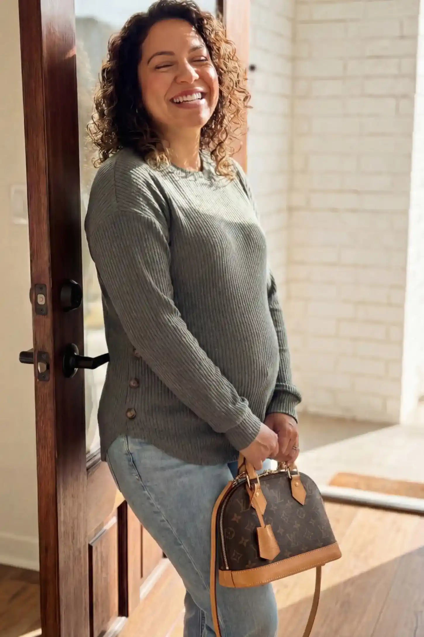 Ribbed Long Sleeve Maternity Nursing Top Ribbed Long Sleeve Maternity Nursing Top in Gray featuring functional side buttons on a pregnant model.