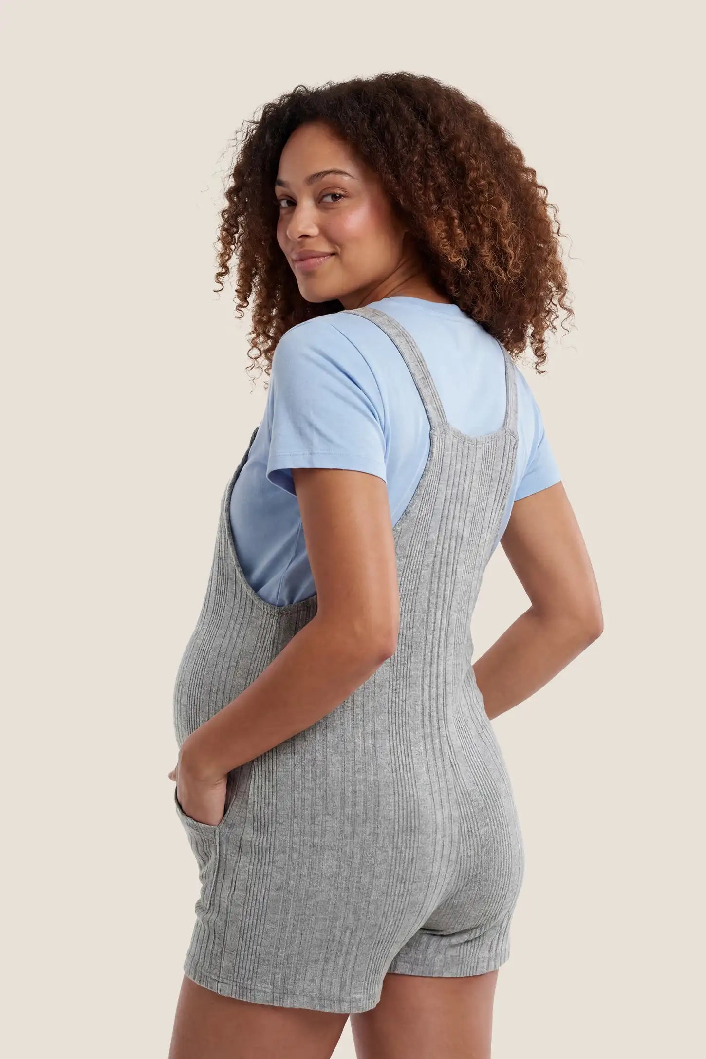 Ribbed Pocket Knit Maternity Romper Back view of the gray Ribbed Pocket Knit Maternity Romper for pregnancy and postpartum comfort.