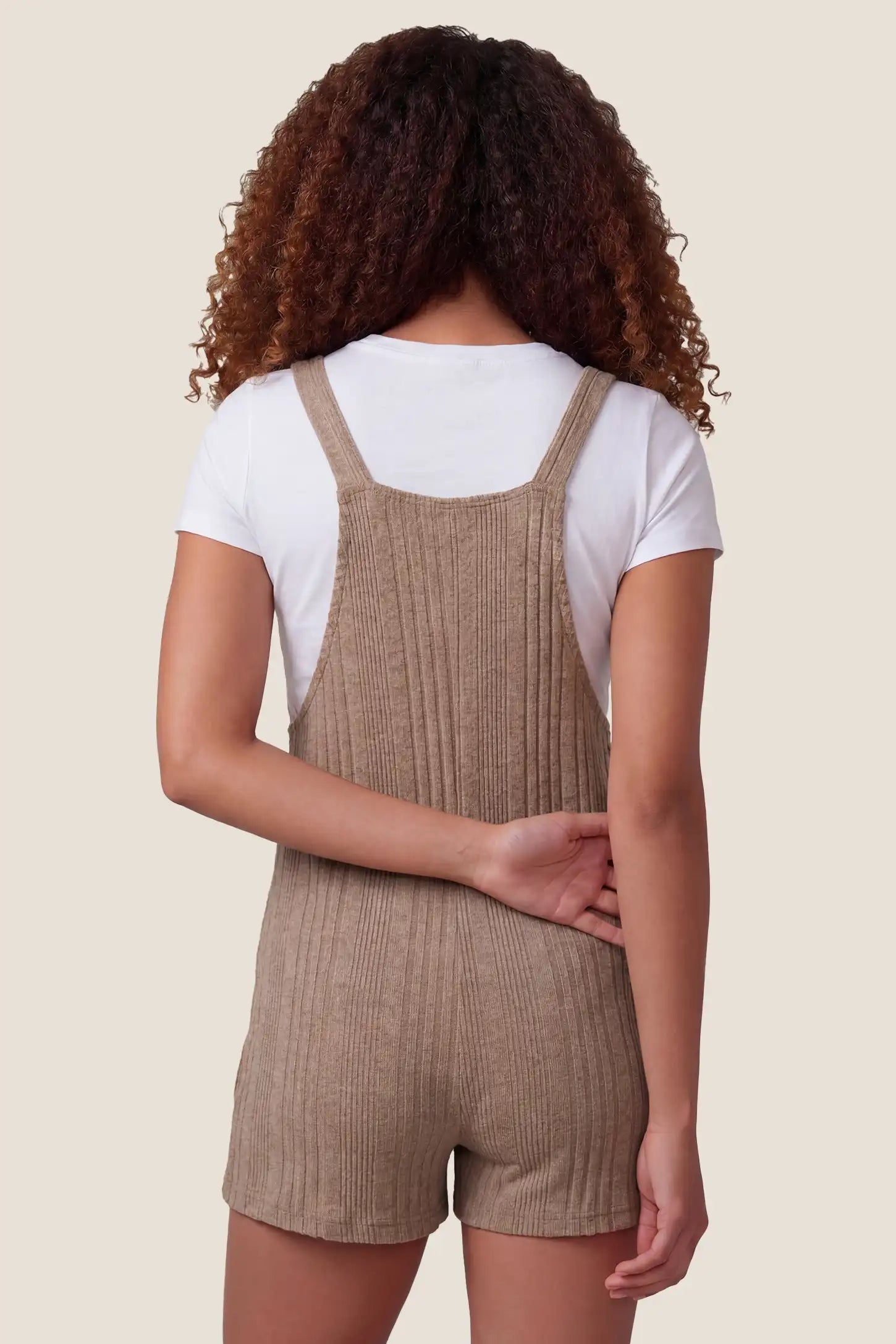 Ribbed Pocket Knit Maternity Romper Back view of the khaki Ribbed Pocket Knit Maternity Romper with a soft ribbed texture and relaxed fit.

