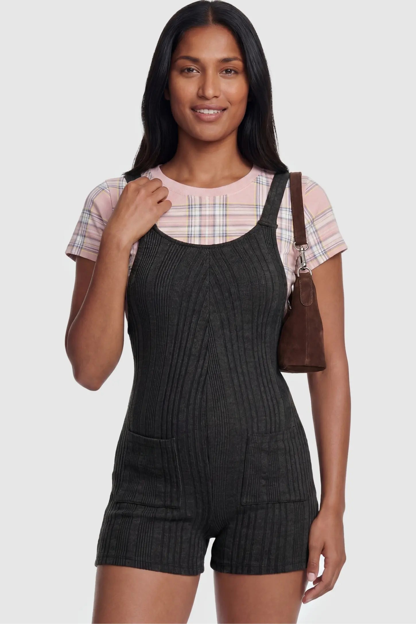 Ribbed Pocket Knit Maternity Romper Ribbed Pocket Knit Romper in Black featuring a flattering ribbed silhouette on a non-pregnant model, front view.
