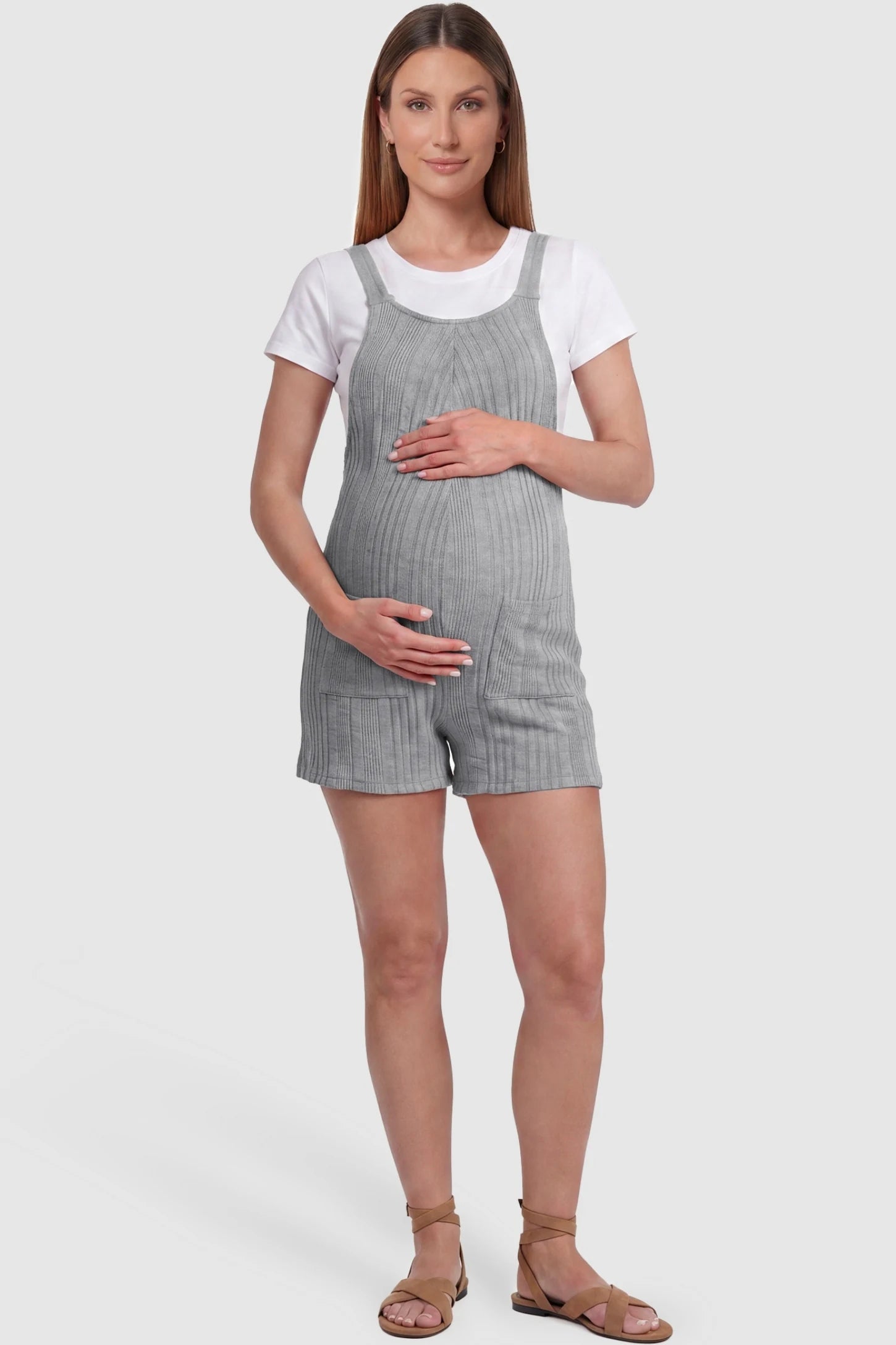Ribbed Pocket Knit Maternity Romper Ribbed Pocket Knit Romper in Gray featuring a classic vertical ribbed texture on a pregnant model, front view