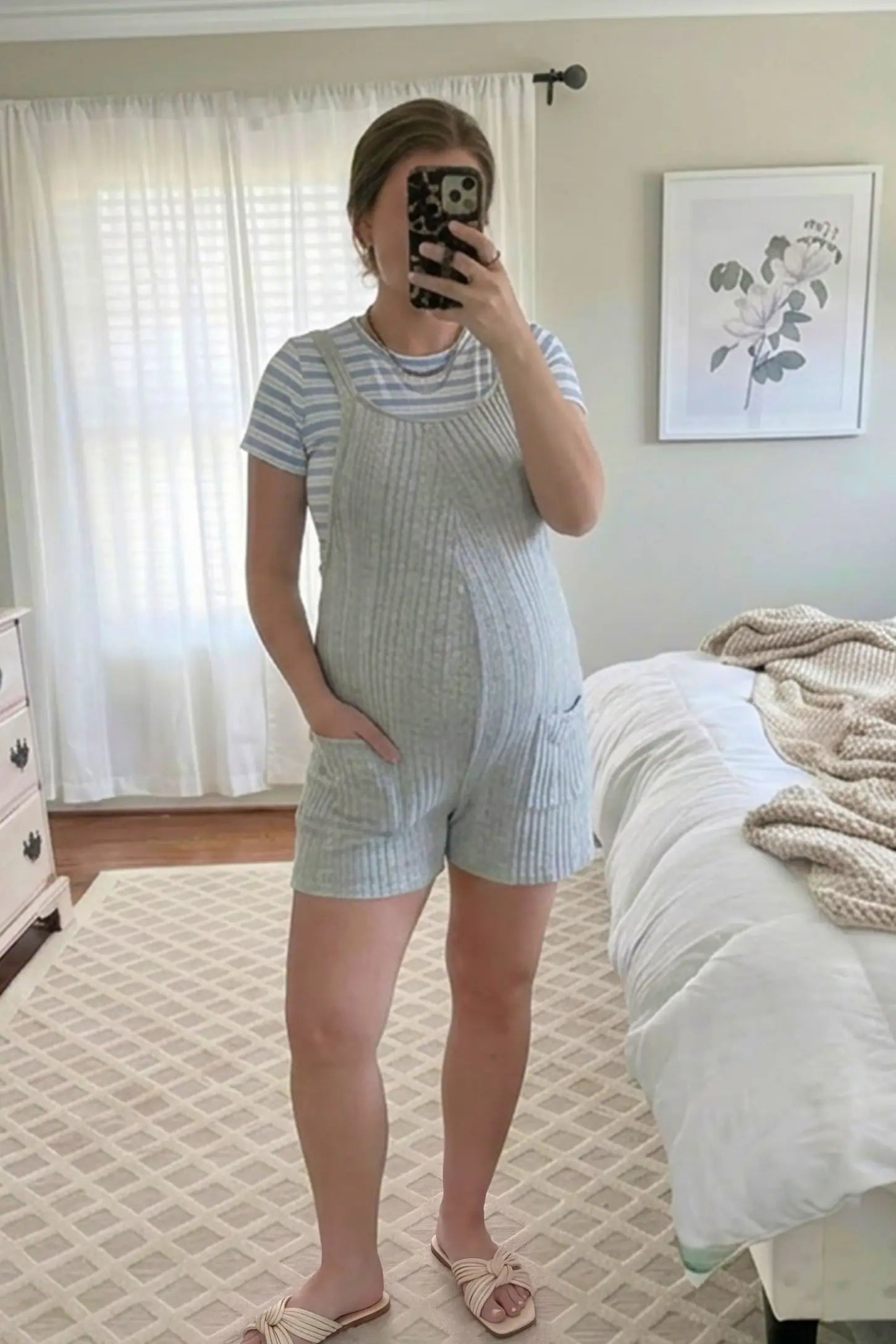 Ribbed Pocket Knit Maternity Romper Ribbed Pocket Knit Romper in Gray featuring a soft ribbed finish on a pregnant model, mirror selfie view.