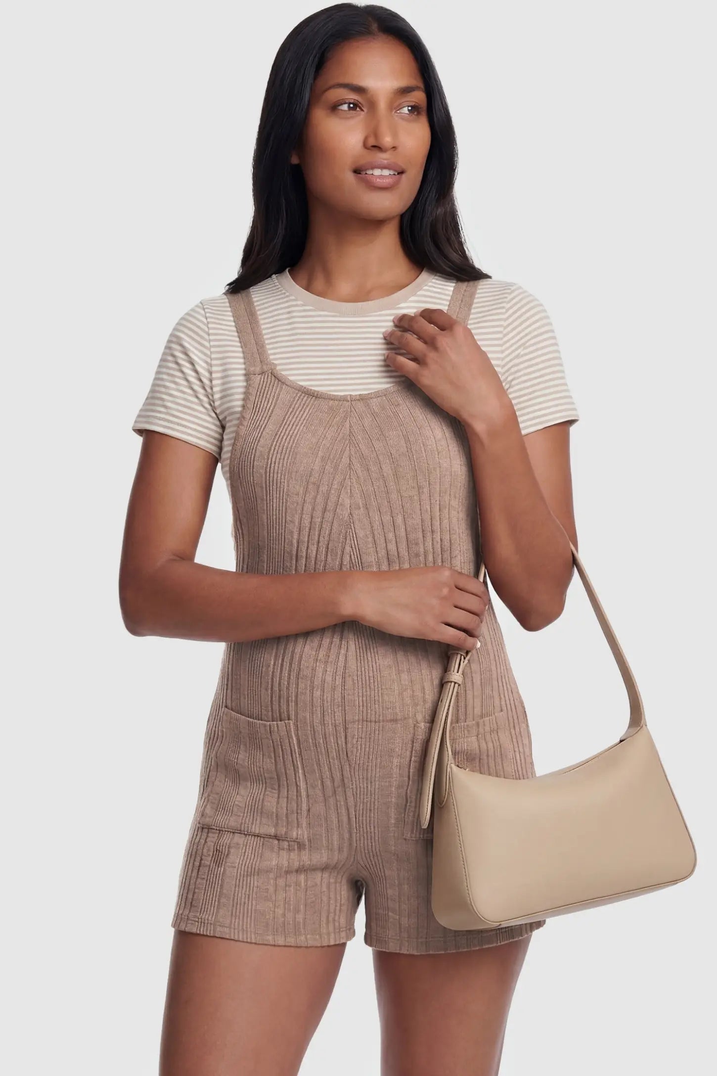 Ribbed Pocket Knit Maternity Romper Ribbed Pocket Knit Romper in Khaki featuring a flattering ribbed silhouette on a non-pregnant model, front view.