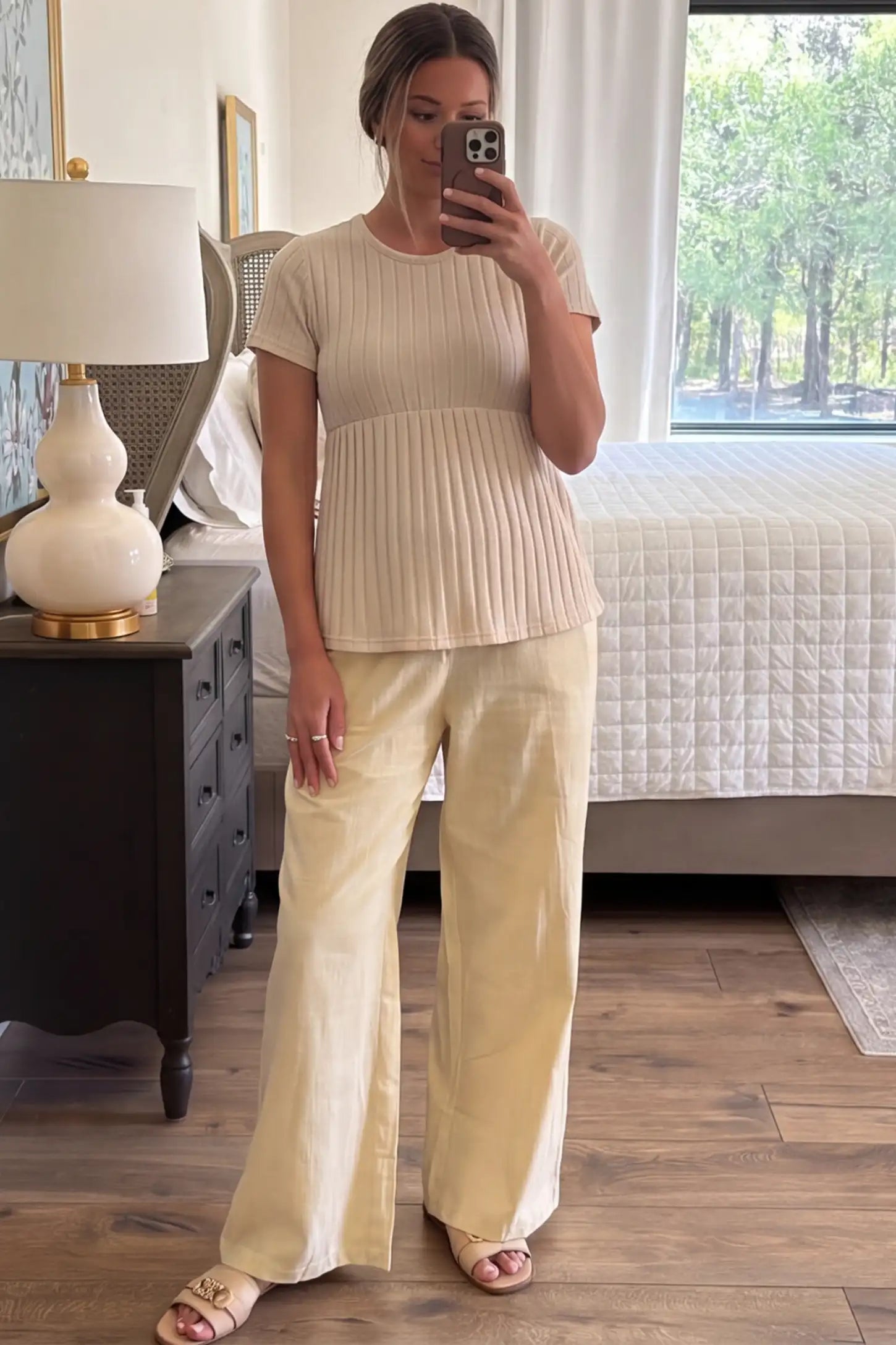 Ribbed Round Neck Short Sleeve Maternity Top Ribbed Round Neck Short Sleeve Maternity Top in Beige featuring a soft knit stretch and short sleeves on a pregnant model in indoor setting , front view.