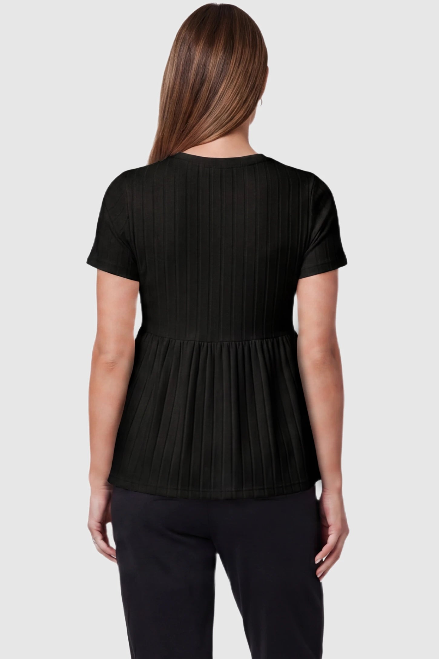 Ribbed Round Neck Short Sleeve Maternity Top Ribbed Round Neck Short Sleeve Maternity Top in Black featuring a soft knit stretch and short sleeves on a pregnant model, back view.