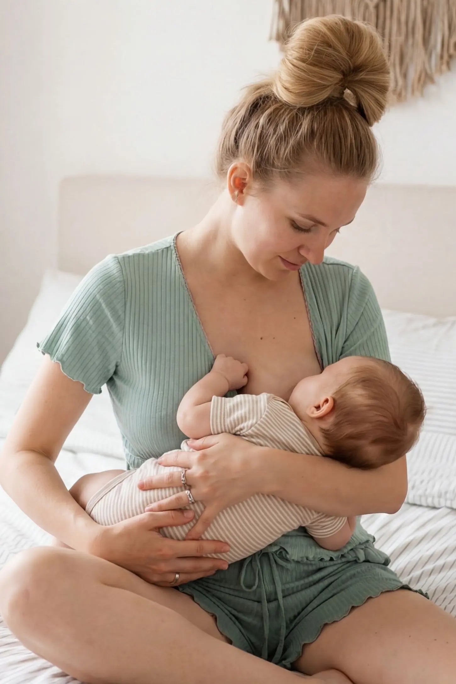 Ribbed Short Sleeve & Drawstring Shorts Maternity Pajama Set Ribbed Short Sleeve & Drawstring Shorts Maternity Pajama Set in Green featuring breathable micro-ribbed fabric on a breastfeedingt model, front view.