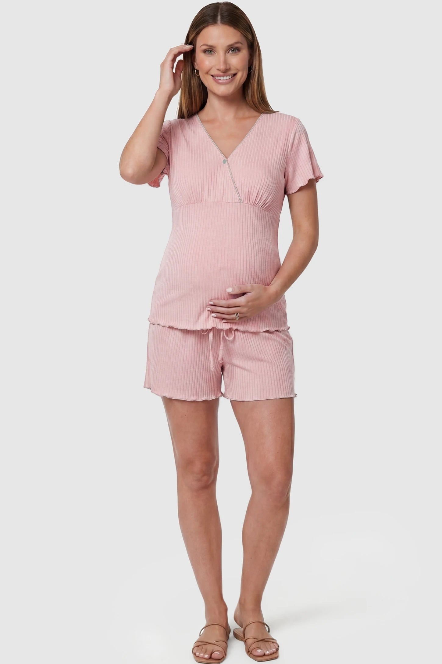 Ribbed Short Sleeve & Drawstring Shorts Maternity Pajama Set Ribbed Short Sleeve & Drawstring Shorts Maternity Pajama Set in Pink featuring soft fine-rib knit on a pregnant model, front view.