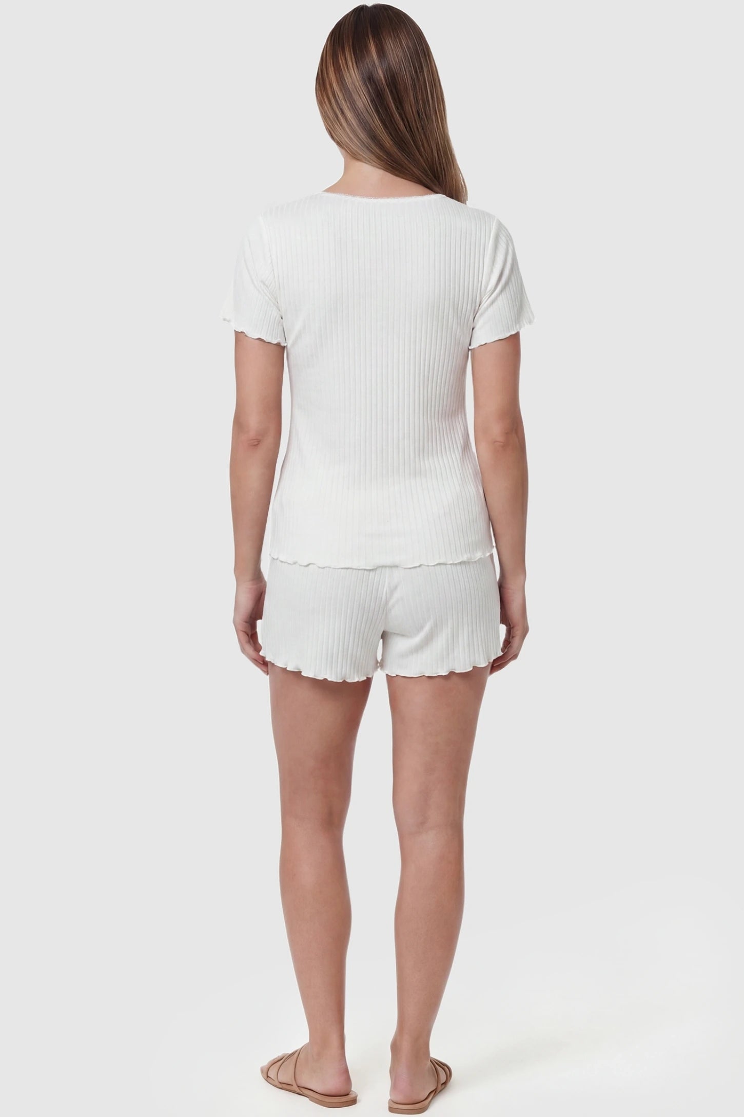 Ribbed Short Sleeve & Drawstring Shorts Maternity Pajama Set Ribbed Short Sleeve & Drawstring Shorts Maternity Pajama Set in White featuring soft fine-rib knit on a pregnant model, back view.
