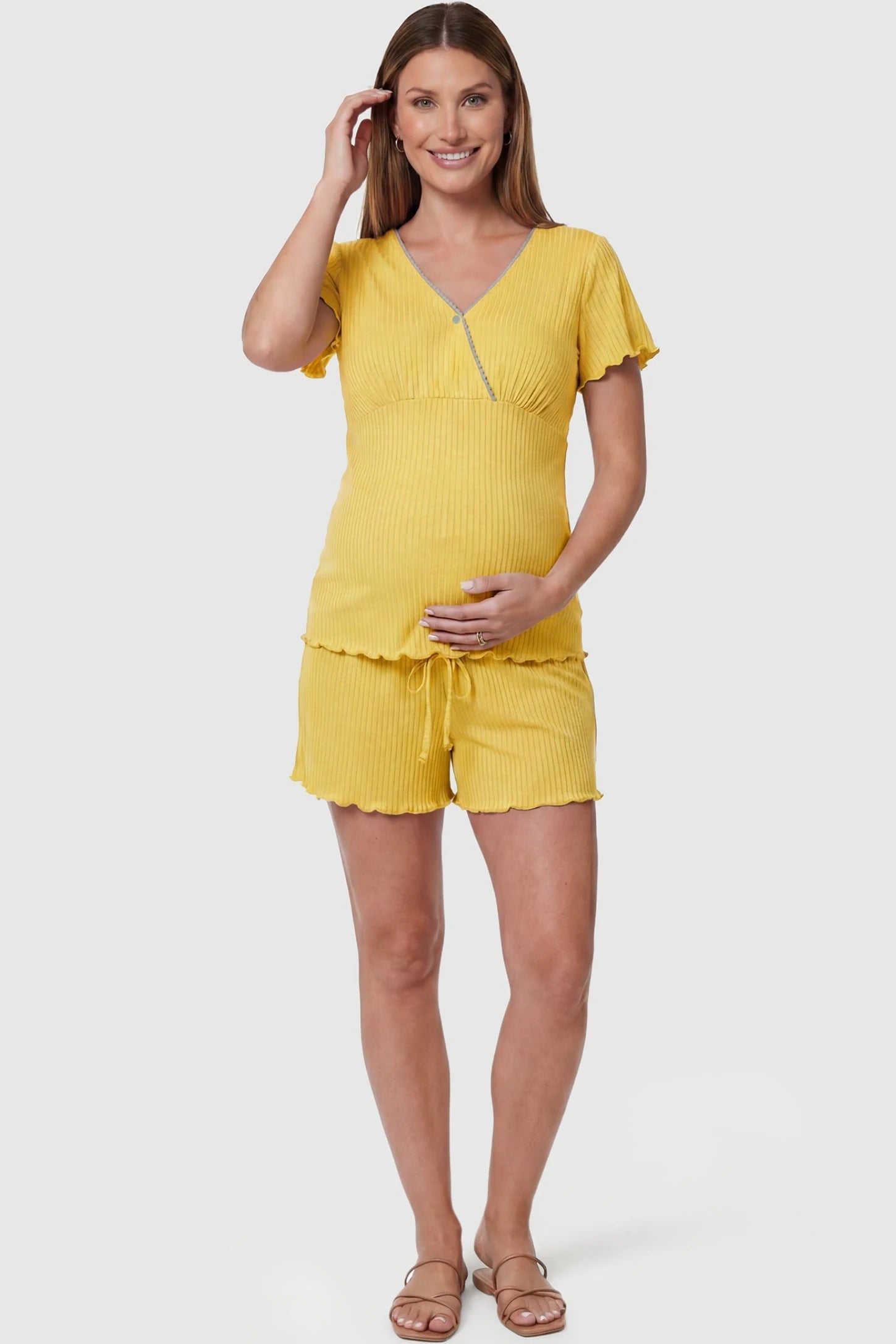Ribbed Short Sleeve & Drawstring Shorts Maternity Pajama Set Ribbed Short Sleeve & Drawstring Shorts Maternity Pajama Set in Yellow featuring soft fine-rib knit on a pregnant model, front view.