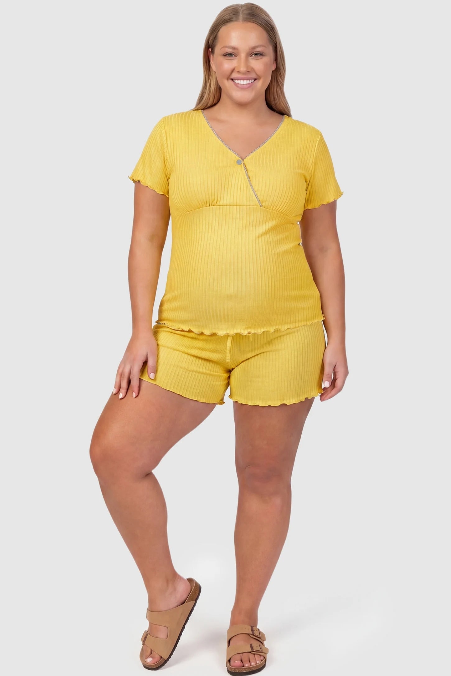 Ribbed Short Sleeve & Drawstring Shorts Maternity Pajama Set Ribbed Short Sleeve & Drawstring Shorts Maternity Pajama Set in Yellow featuring soft fine-rib knit on a pregnant plus-size model, front view.