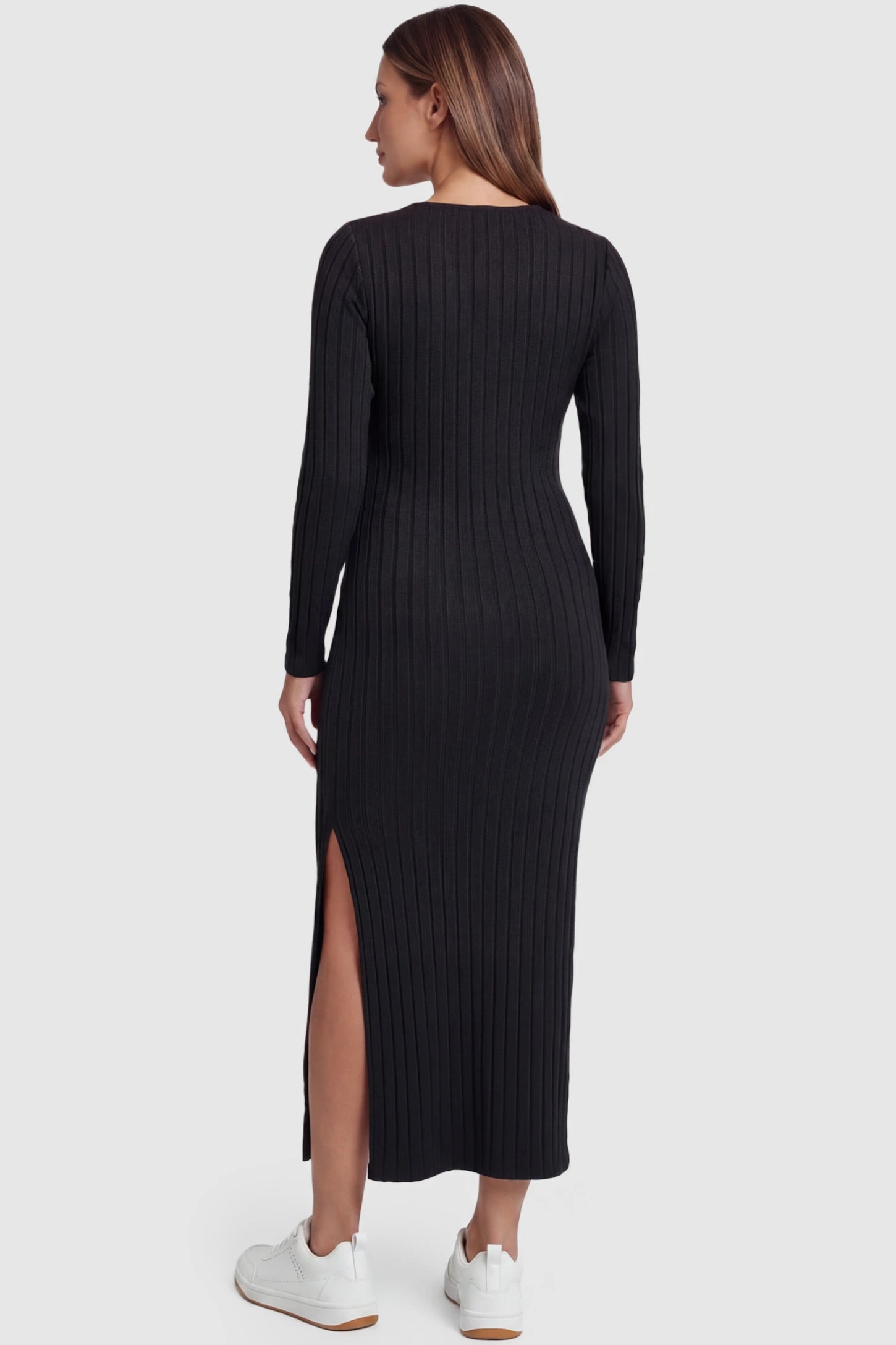 Ribbed Side Slit Fitted Long Sleeve Maternity Maxi Dress Ribbed Side Slit Fitted Long Sleeve Maternity Maxi Dress in Black featuring a high side slit on a pregnant model, back view.