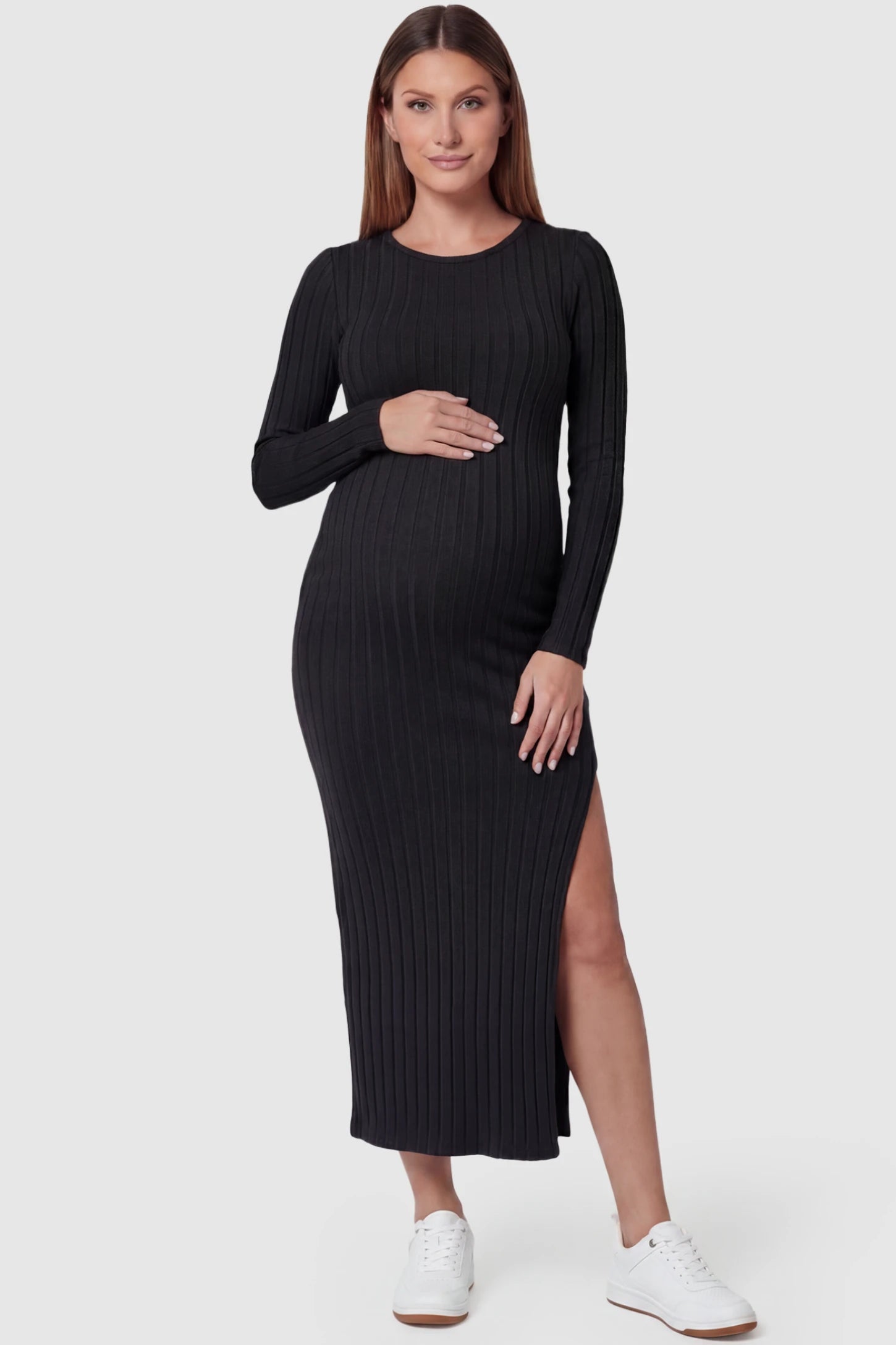 Ribbed Side Slit Fitted Long Sleeve Maternity Maxi Dress Ribbed Side Slit Fitted Long Sleeve Maternity Maxi Dress in Black featuring a high side slit on a pregnant model, front view.
