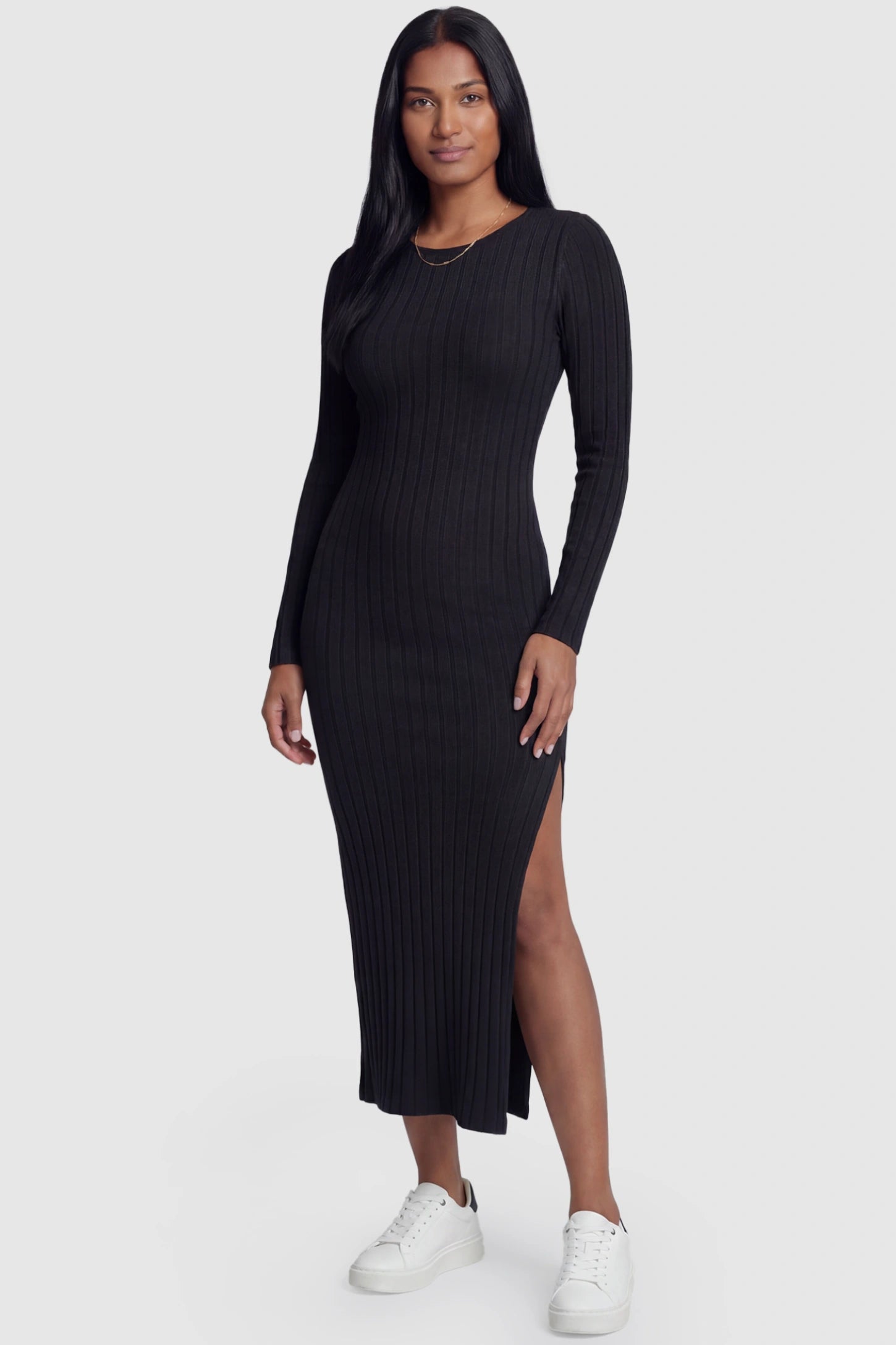 Ribbed Side Slit Fitted Long Sleeve Maternity Maxi Dress Ribbed Side Slit Fitted Long Sleeve Maternity Maxi Dress in Black featuring a high side slit on a postpartum model, front view.