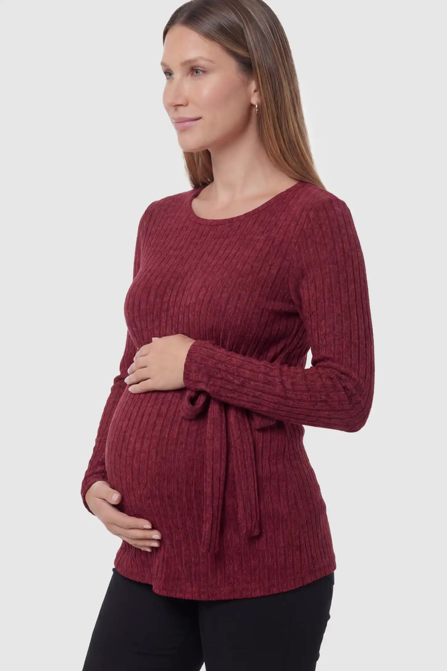 Ribbed Tie-Waist Long Sleeve Maternity Top Ribbed Tie-Waist Long Sleeve Maternity Top in red featuring an adjustable waist on a pregnant model showing side.