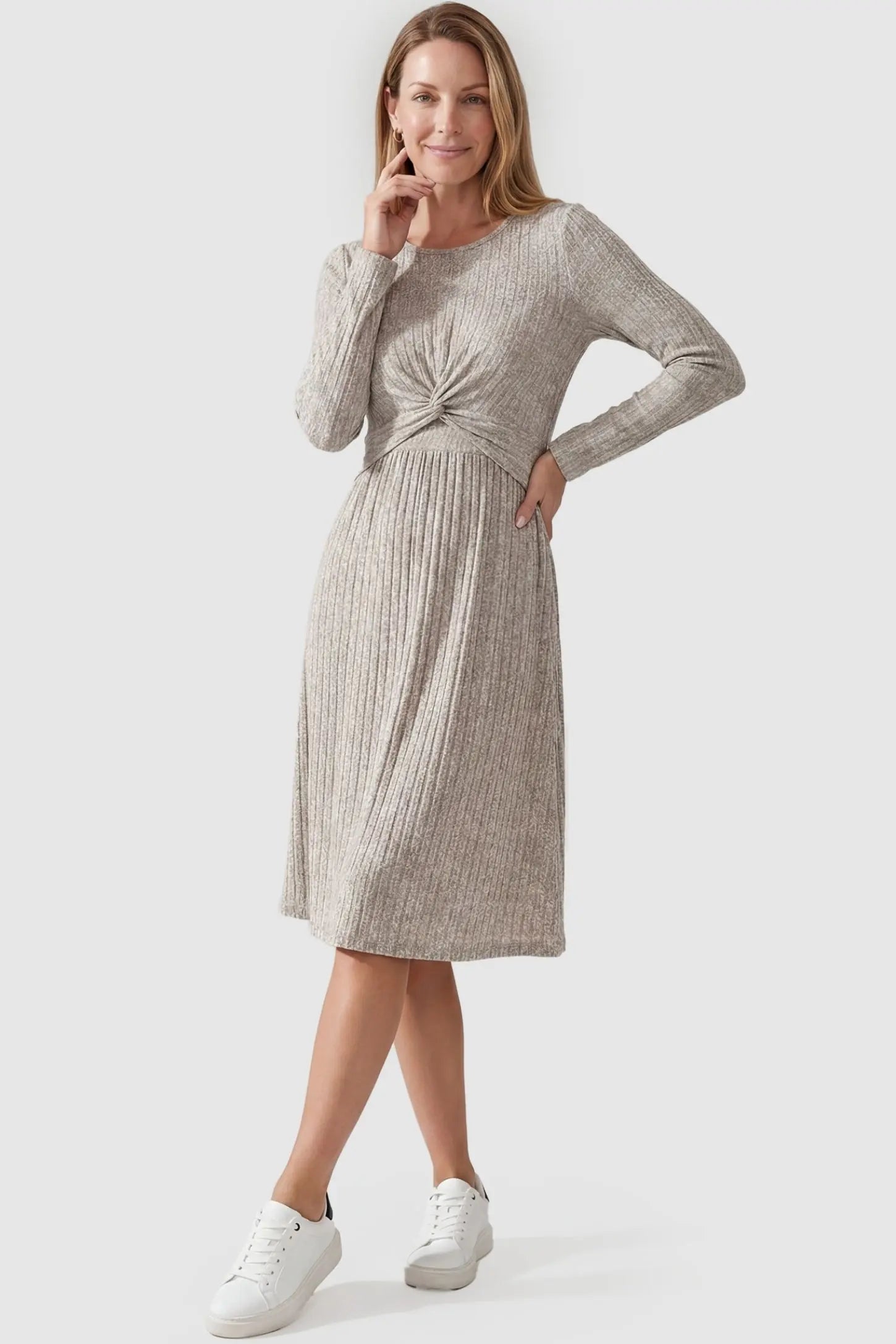 Ribbed Twist Front Nursing Skater Dress Ribbed Twist Front Nursing Skater Dress in Oatmeal featuring a long sleeve ribbed texture on a non-pregnant model, front view.