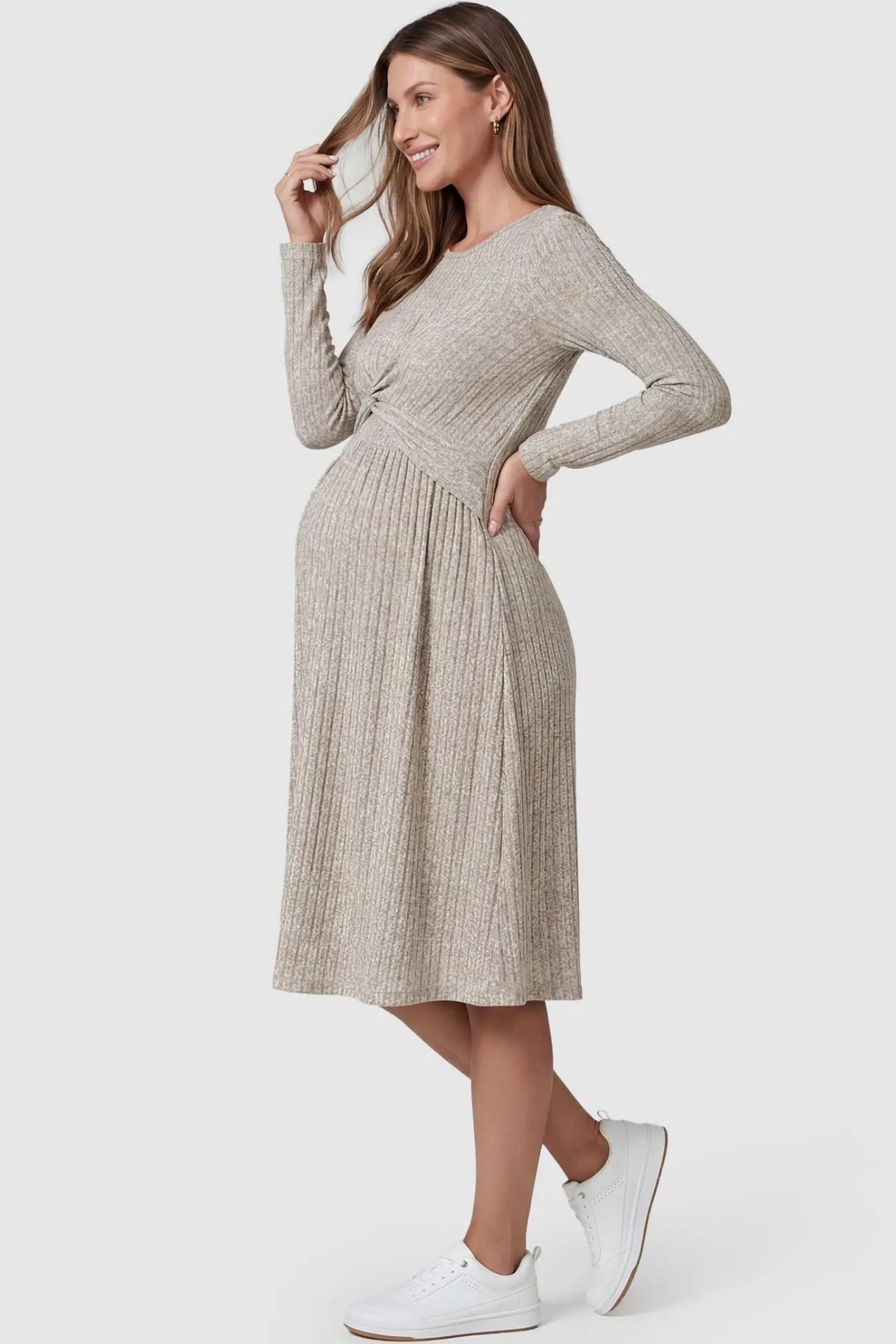 Ribbed Twist Front Nursing Skater Dress Ribbed Twist Front Nursing Skater Dress in Oatmeal featuring a flared skirt side view on a pregnant model.
