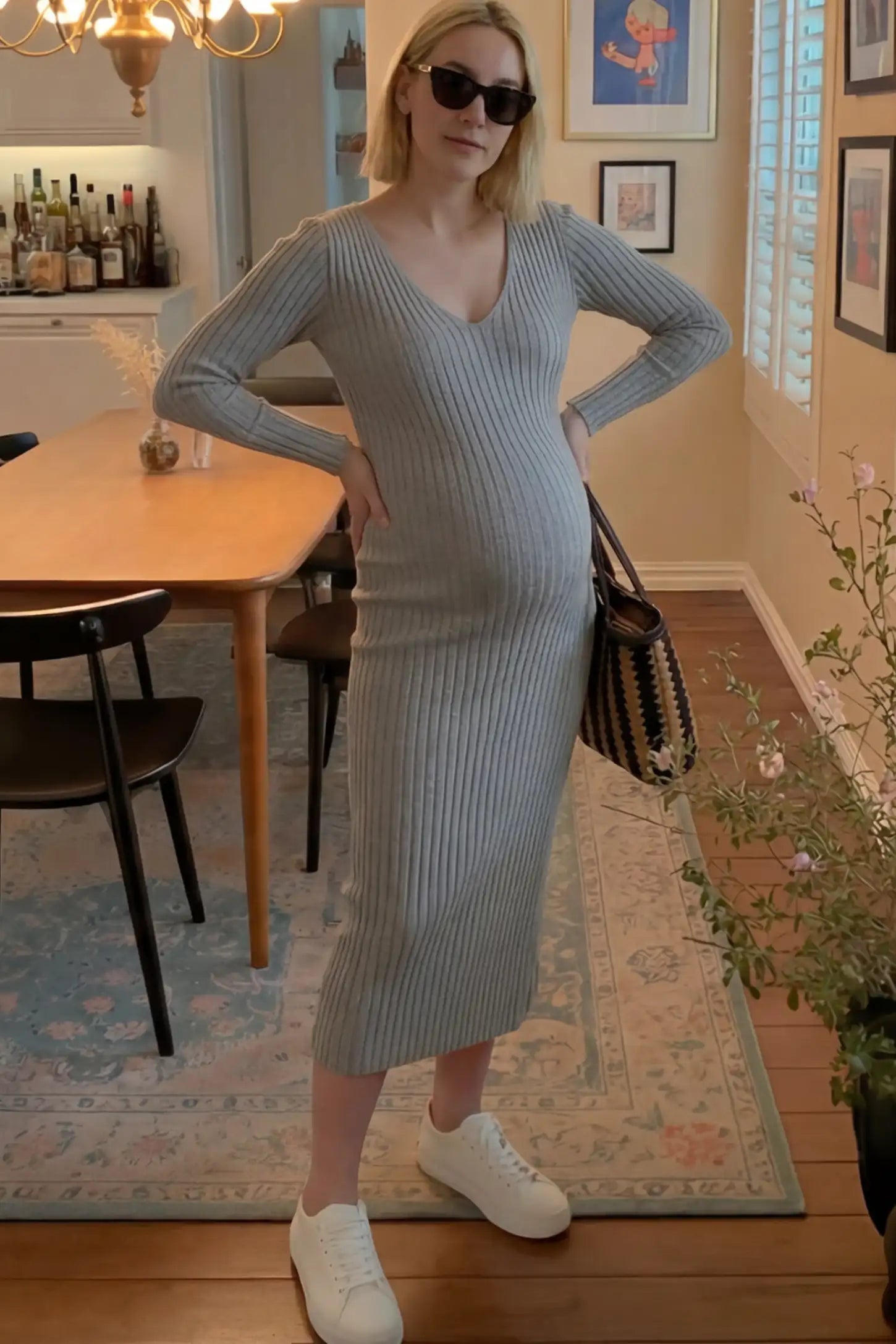Ribbed V-Neck Long Sleeve Maternity Midi Dress Ribbed V-Neck Maternity Midi Dress in Gray featuring a fitted long sleeve on a pregnant model.