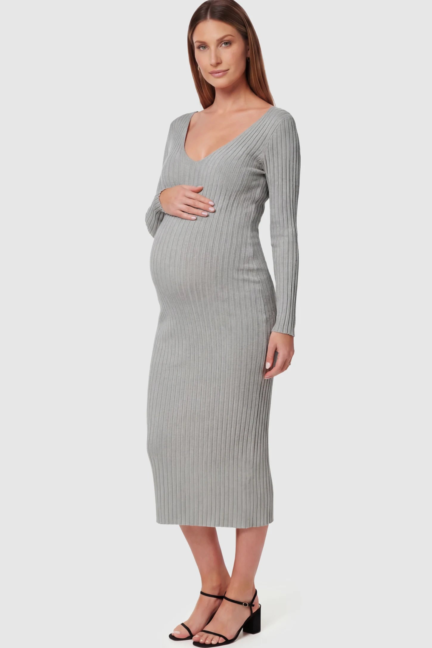 Ribbed V-Neck Long Sleeve Maternity Midi Dress Ribbed V-Neck Maternity Midi Dress in Gray featuring a fitted long sleeve on a pregnant model.