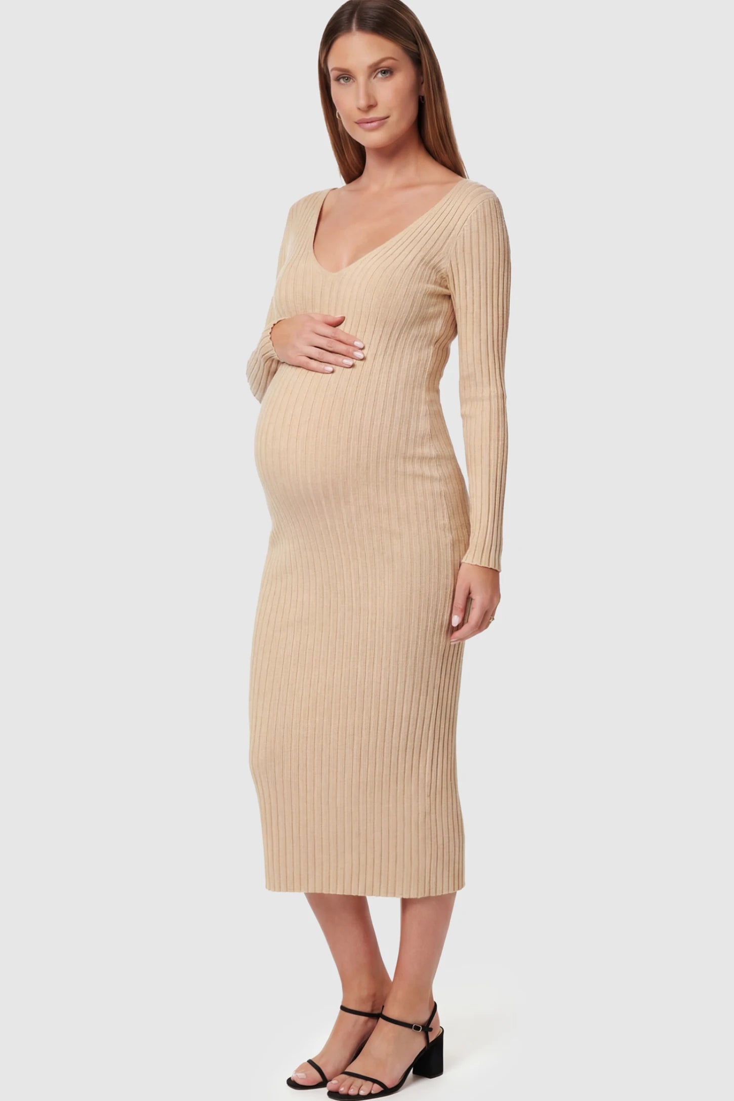 Ribbed V-Neck Long Sleeve Maternity Midi Dress Ribbed V-Neck Maternity Midi Dress in Khaki featuring a fitted long sleeve on a pregnant model.