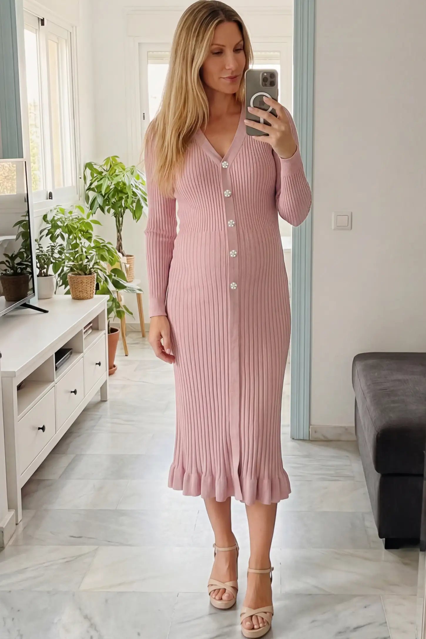 Ribbed V-Neck Maternity Midi Sweater Dress Ribbed V-Neck Maternity Midi Sweater Dress in Pink featuring rhinestone buttons on a pregnant woman showing front.