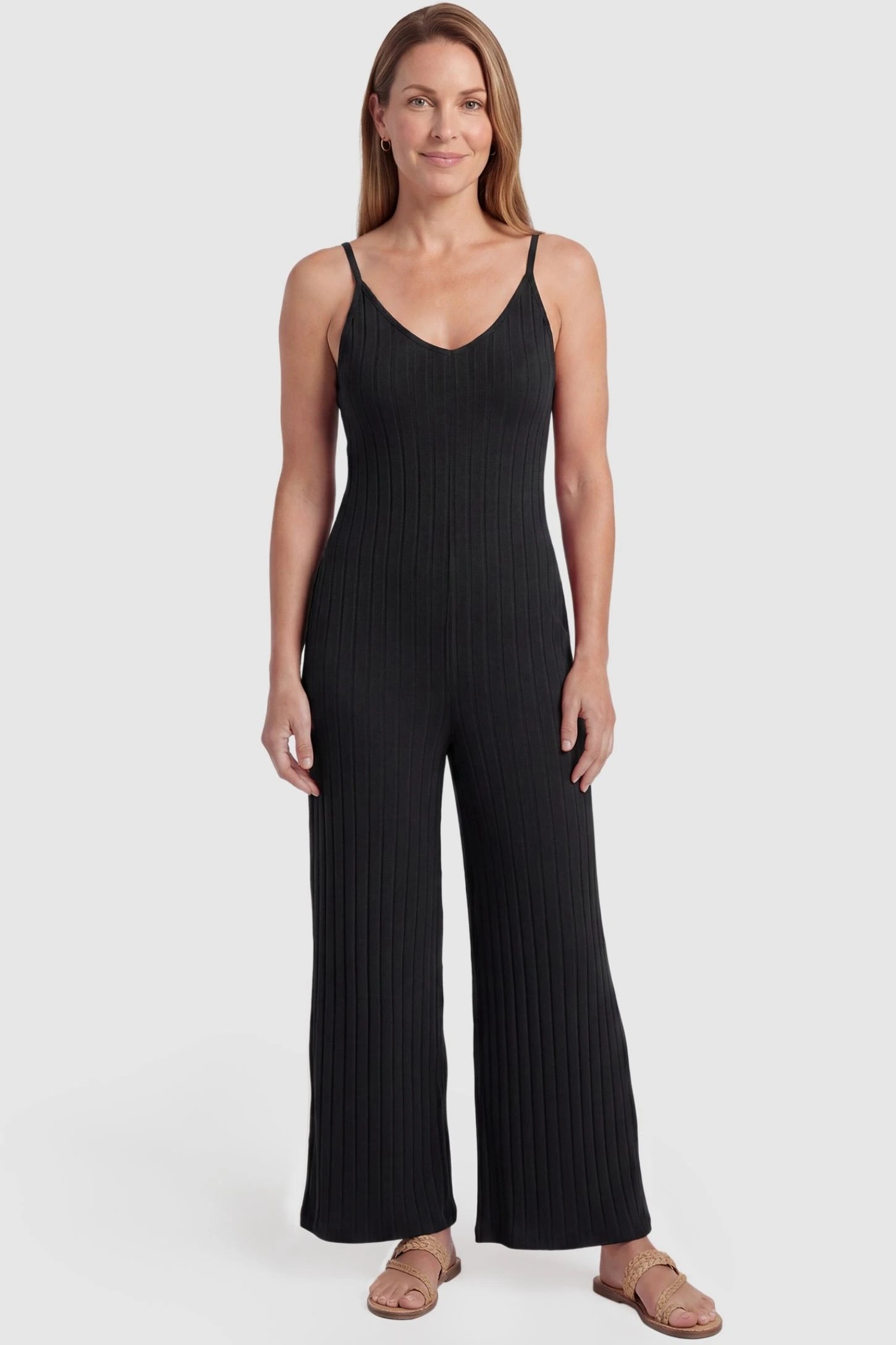 Ribbed Wide-Leg Maternity Camisole Jumpsuit Ribbed Wide-Leg Maternity Camisole Jumpsuit in Black featuring a breathable ribbed blend and wide leg on a non-pregnant model, postpartum view.