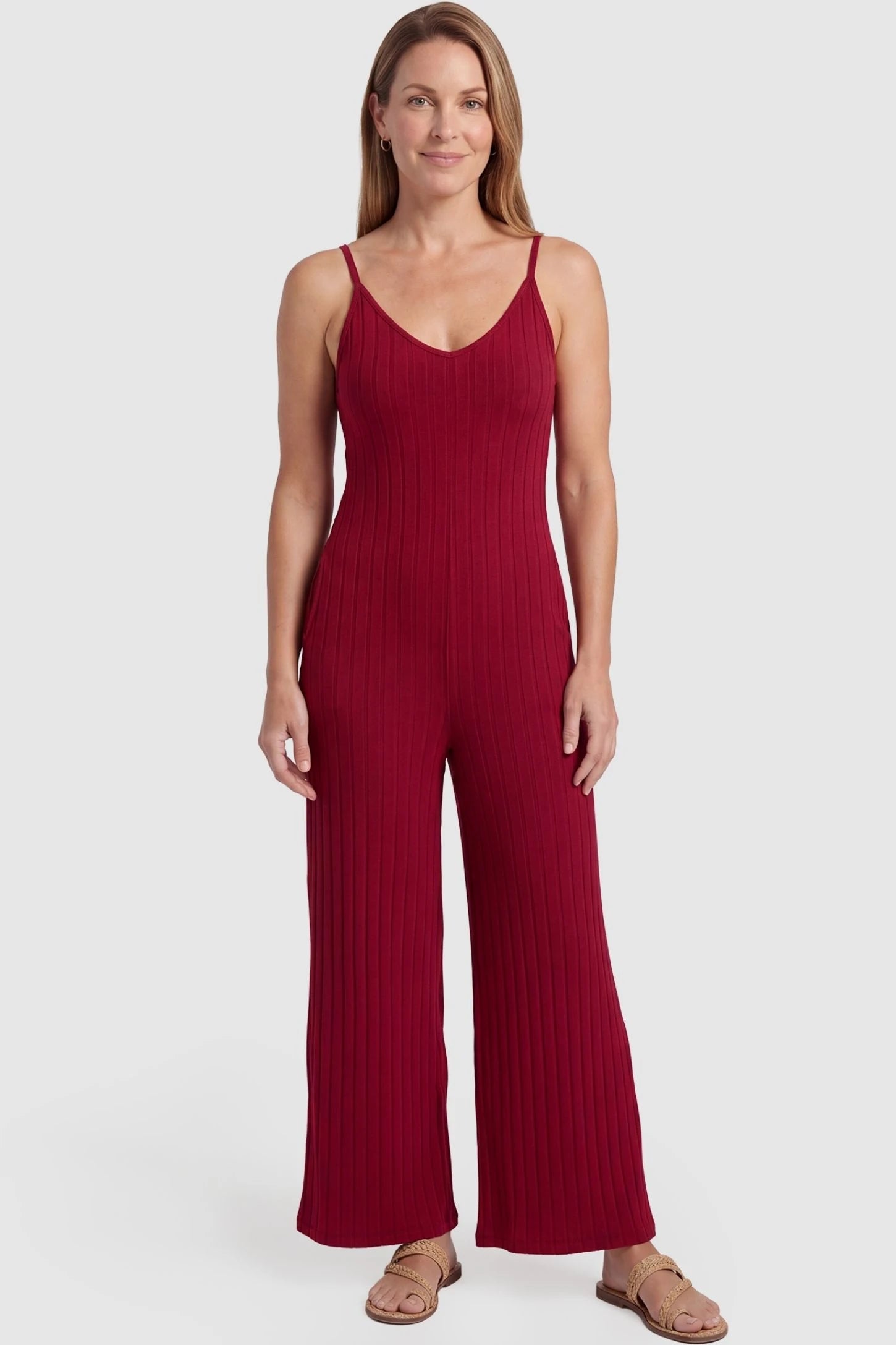 Ribbed Wide-Leg Maternity Camisole Jumpsuit Ribbed Wide-Leg Maternity Camisole Jumpsuit in Red featuring a breathable ribbed blend and wide leg on a non-pregnant model, postpartum view.