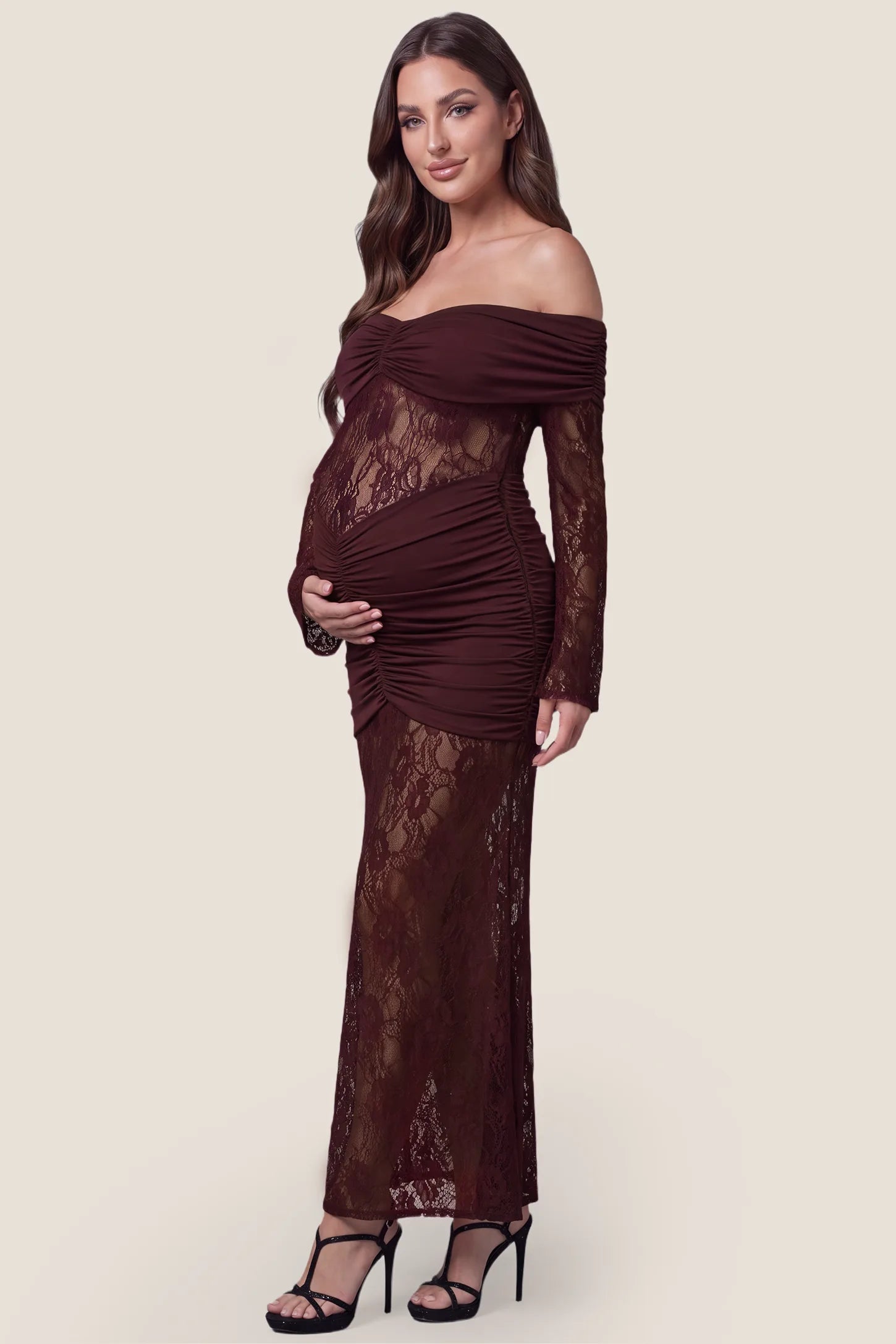 Ruched Lace Off-Shoulder Maternity Gown Ruched Lace Off-Shoulder Maternity Gown in Burgundy showcasing the detailed side ruching and graceful lace overlay, side view on a pregnant model.