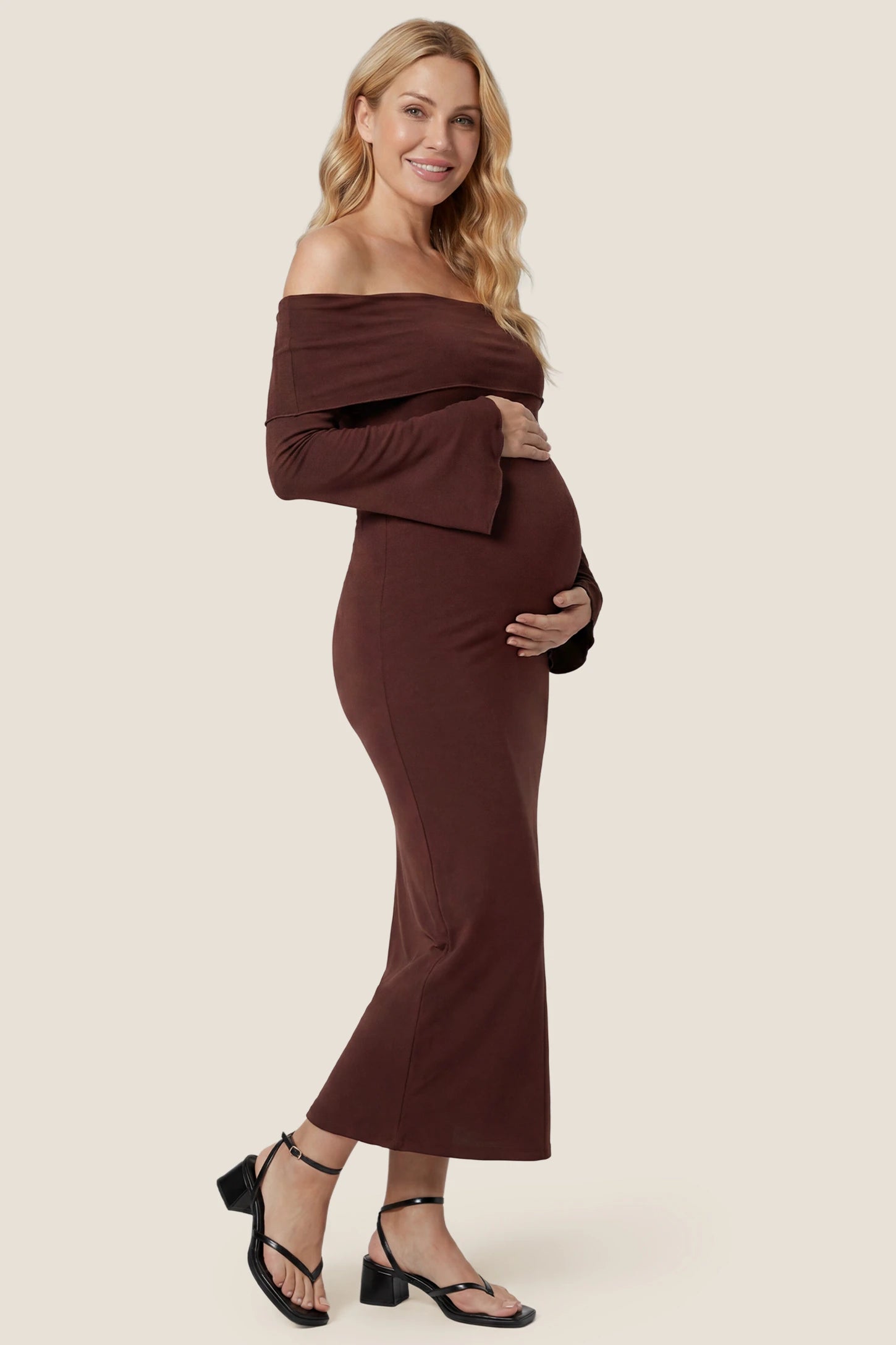 Ruched Off-shoulder Bodycon Maternity Midi Dress Ruched Off-shoulder Bodycon Maternity Midi Dress in Coffee showcasing the detailed ruching and bodycon fit, side view on a pregnant model.