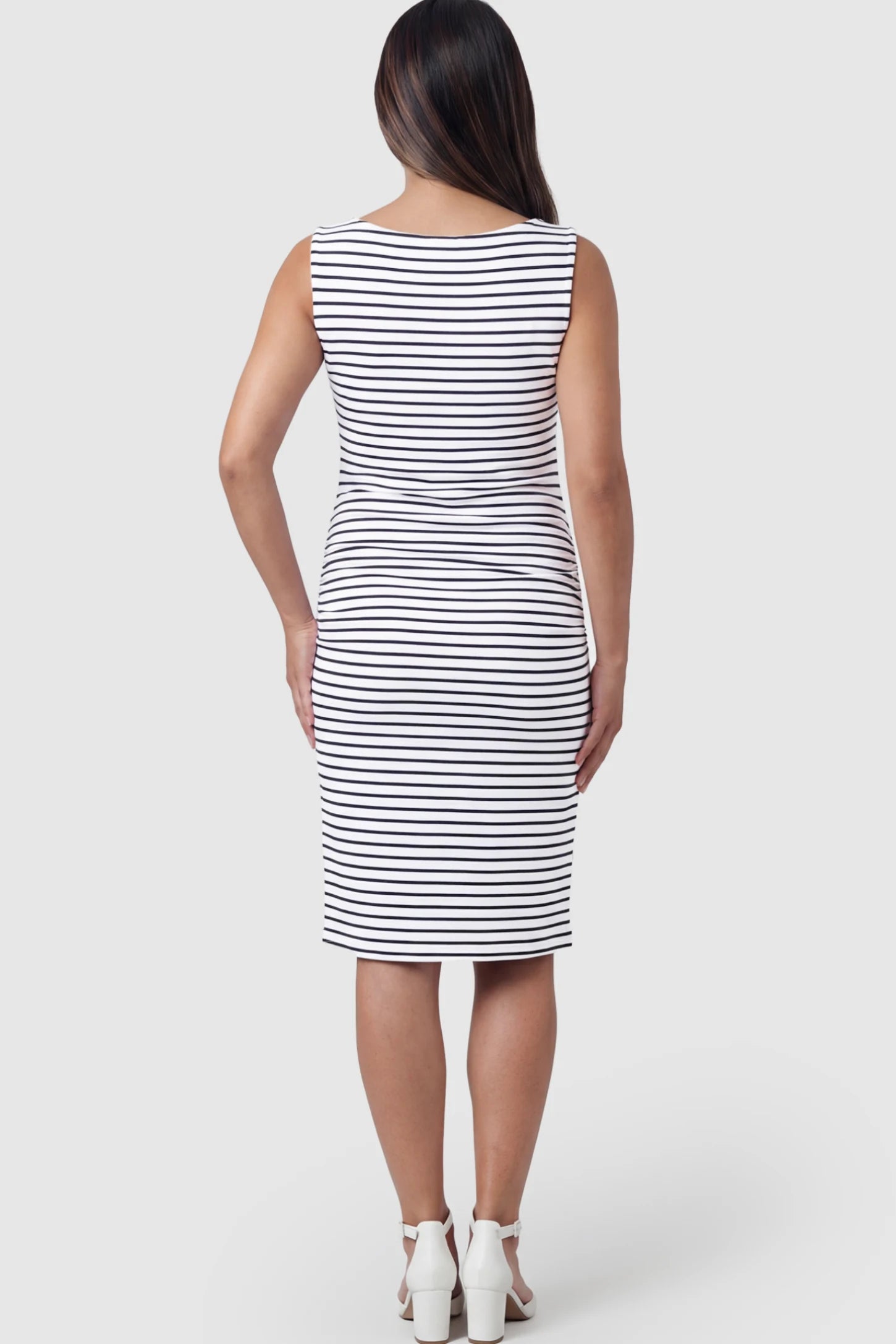 Ruched Sleeveless Bodycon Maternity Midi Dress Ruched Sleeveless Bodycon Maternity Midi Dress in Black white stripe pattern featuring breathable cotton on a pregnant model showing back.