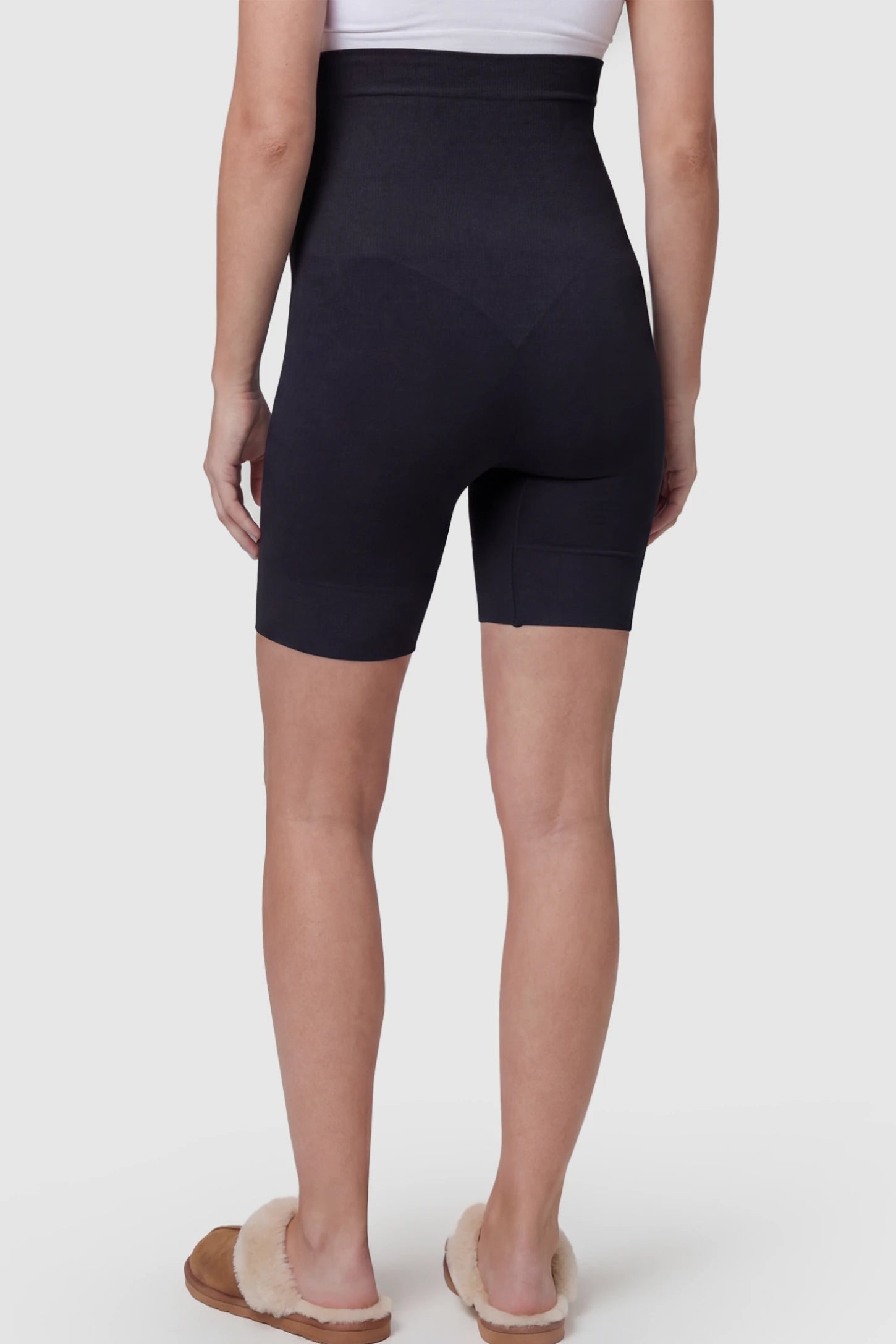 Seamless High Waist Support Maternity Shapewear Shorts Seamless High Waist Support Maternity Shapewear Shorts in Black Color featuring high waist on a pregnant model showing back.