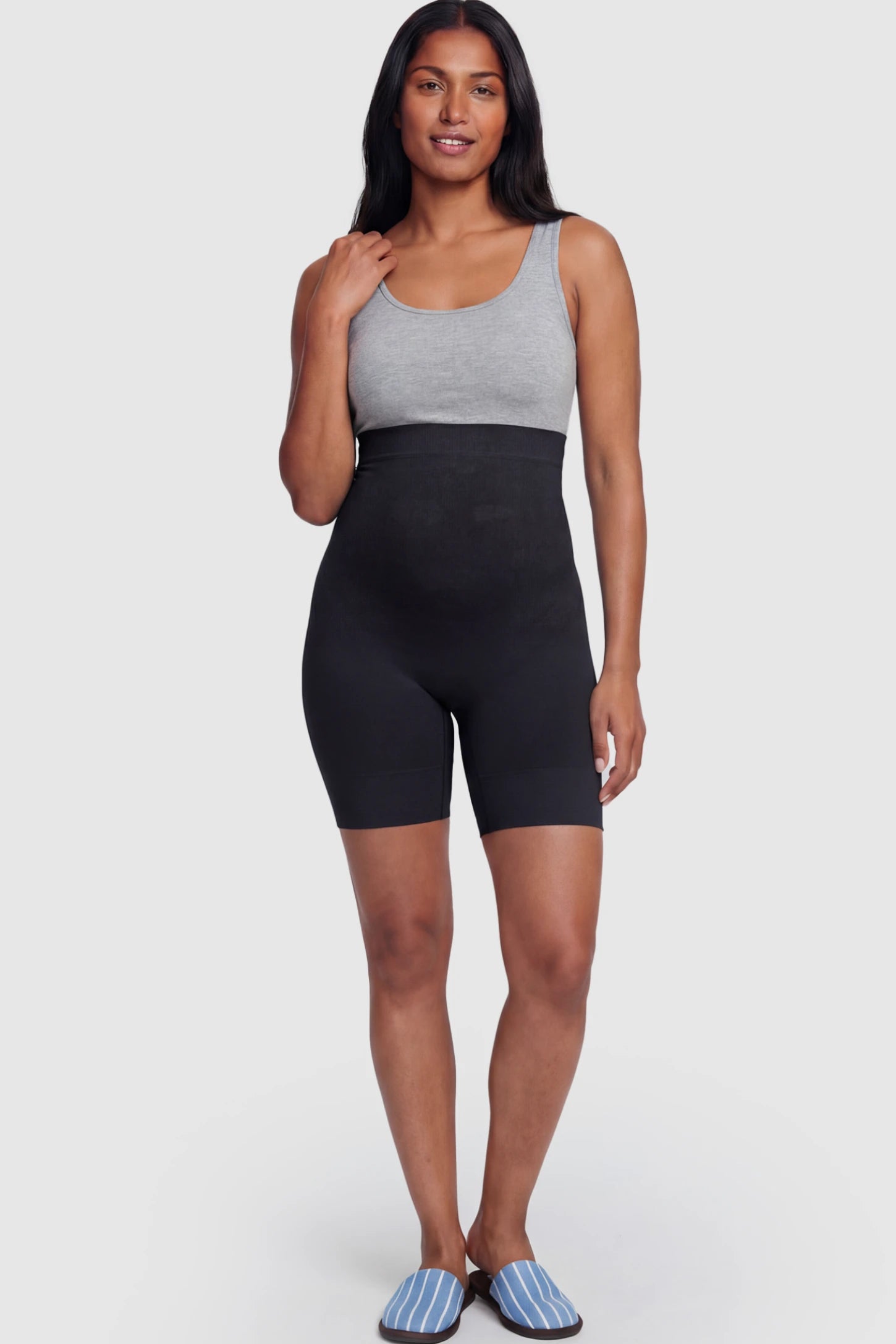 Seamless High Waist Support Maternity Shapewear Shorts Seamless High Waist Support Maternity Shapewear Shorts in Black Color featuring over-the-belly panel on a postpartum model showing front.