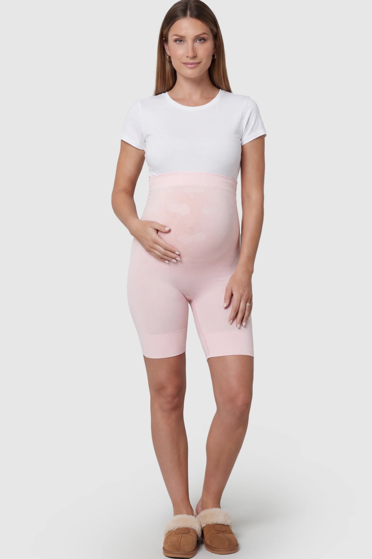Seamless High Waist Support Maternity Shapewear Shorts Seamless High Waist Support Maternity Shapewear Shorts in pink Color featuring over-the-belly panel on a pregnant model showing front.