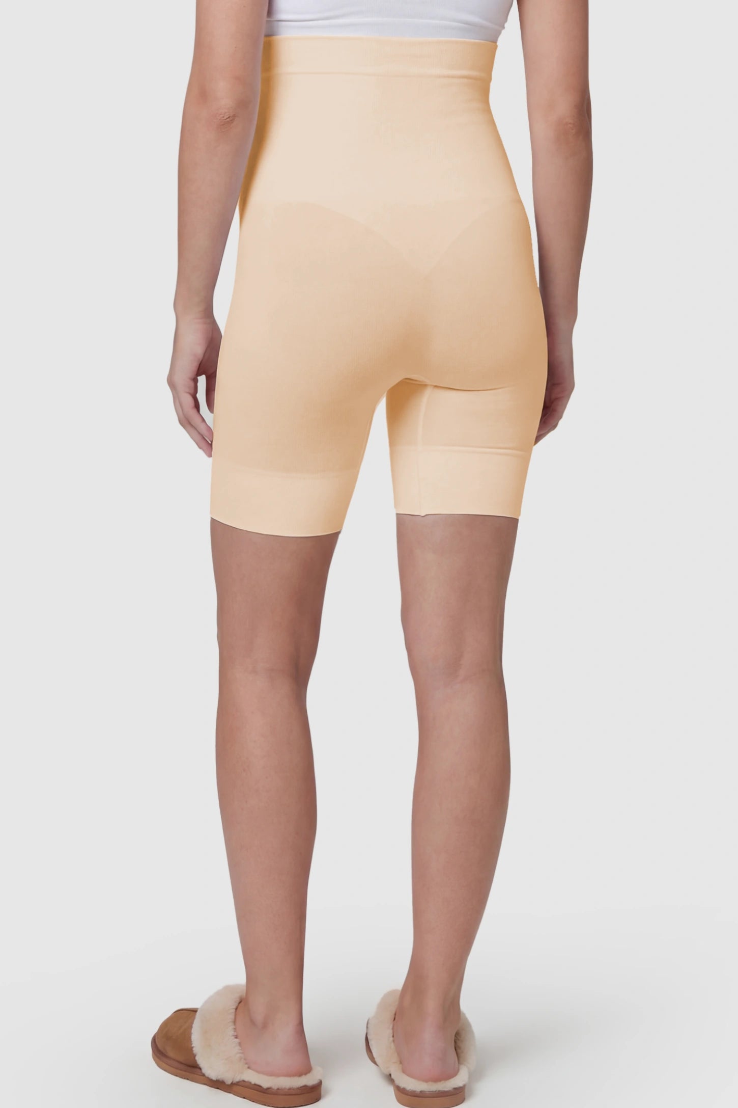Seamless High Waist Support Maternity Shapewear Shorts Seamless High Waist Support Maternity Shapewear Shorts in Skin Color featuring high waist on a pregnant model showing back.