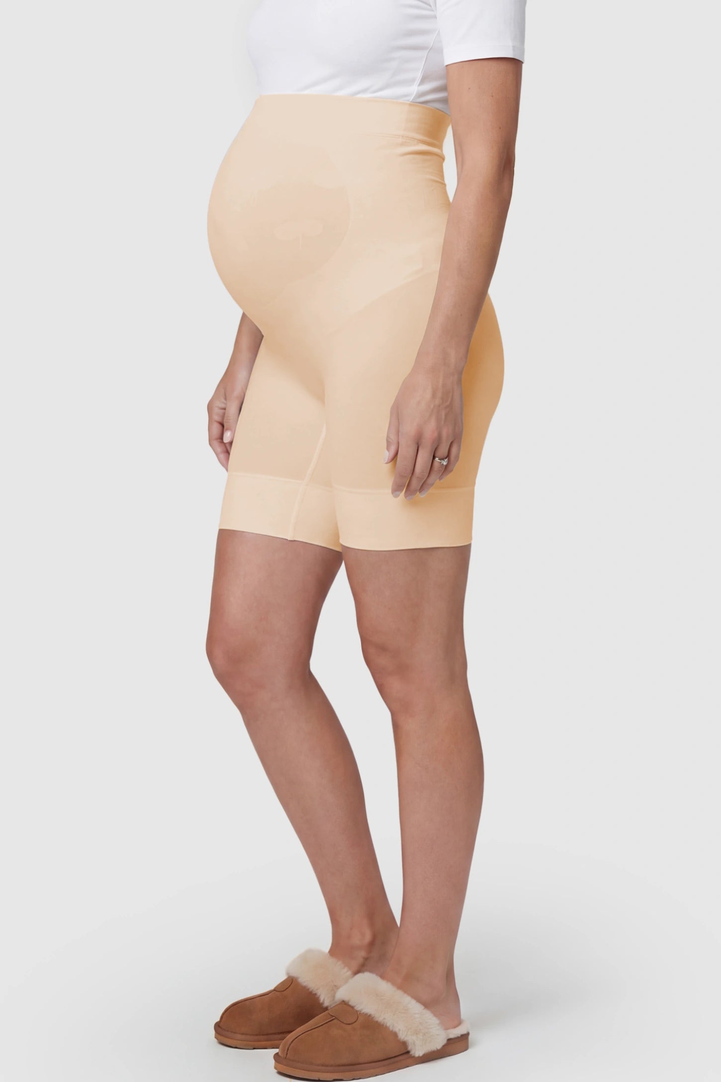 Seamless High Waist Support Maternity Shapewear Shorts Seamless High Waist Support Maternity Shapewear Shorts in Skin Color featuring over-the-belly panel on a pregnant model showing side.