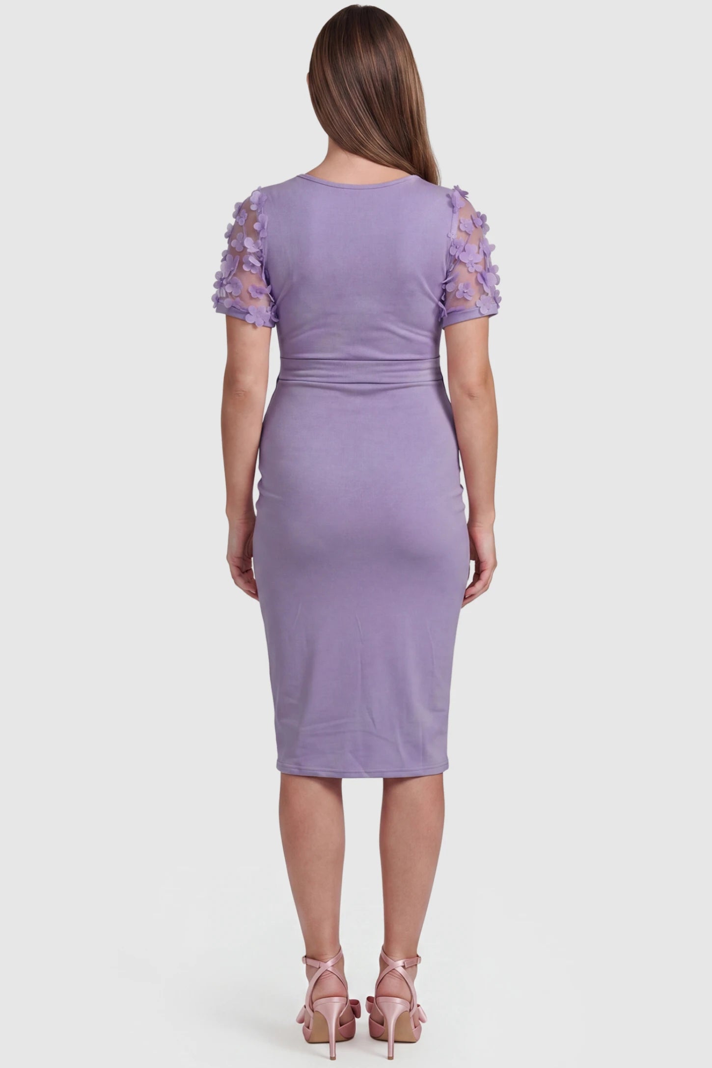 Side Ruched Round Neck Short Sleeve Maternity Short Dress Side Ruched Round Neck Short Sleeve Maternity Short Dress in purple featuring floral-detailed sleeves on a pregnant model, back view.