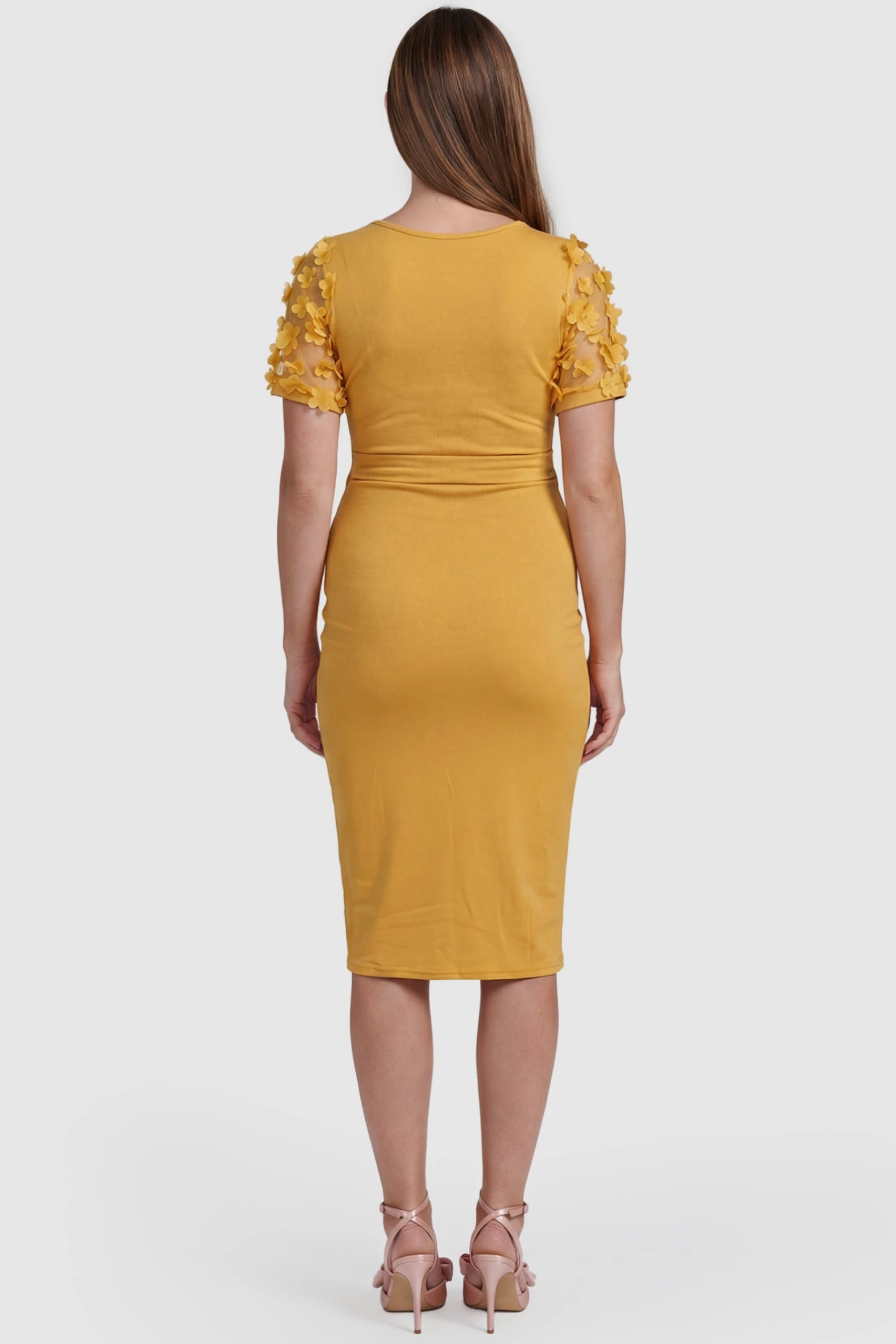 Side Ruched Round Neck Short Sleeve Maternity Short Dress Side Ruched Round Neck Short Sleeve Maternity Short Dress in yellow featuring floral-detailed sleeves on a pregnant model, back view.