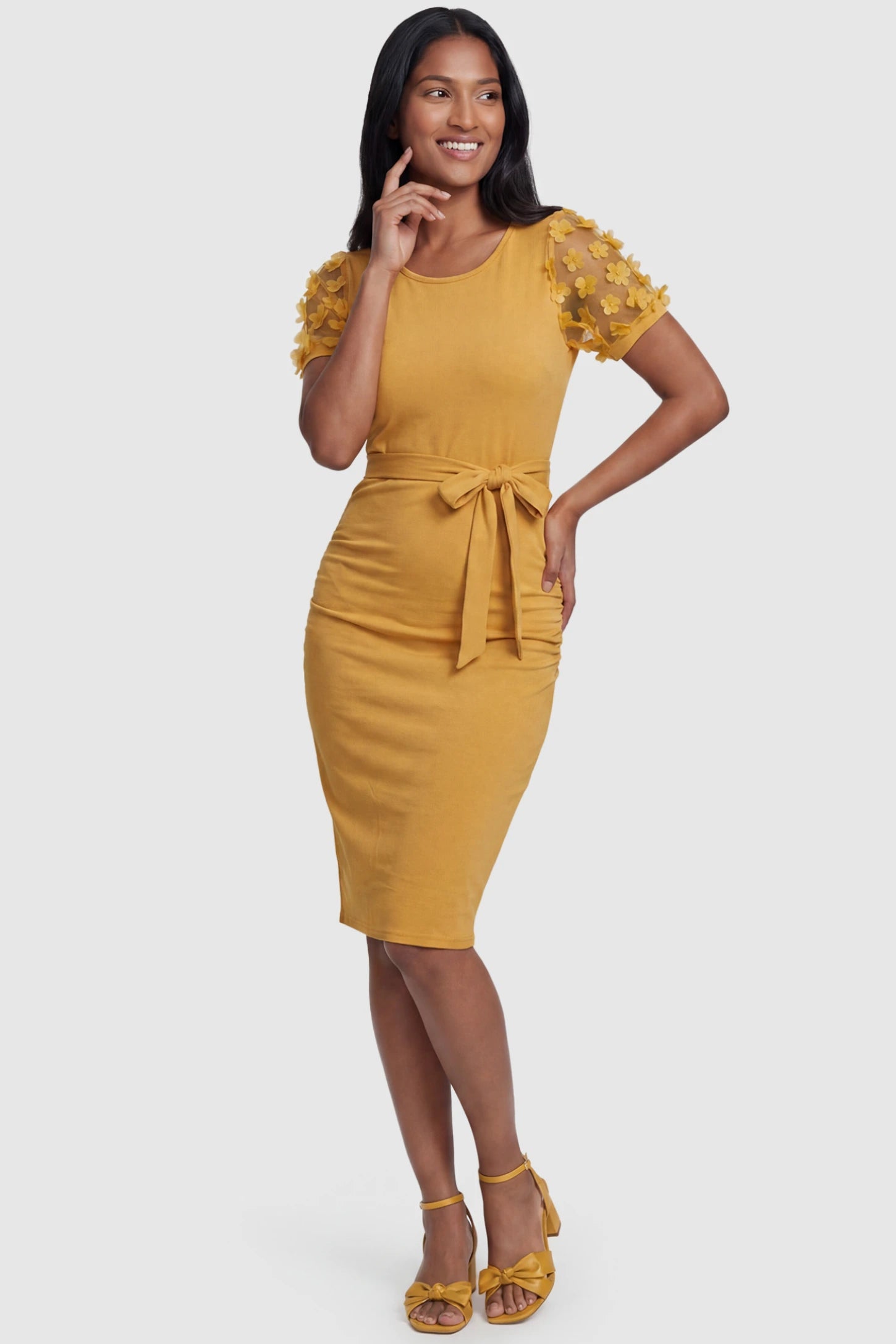Side Ruched Round Neck Short Sleeve Maternity Short Dress Side Ruched Round Neck Short Sleeve Maternity Short Dress in yellow featuring floral-detailed sleeves on a postpartum model, front view.