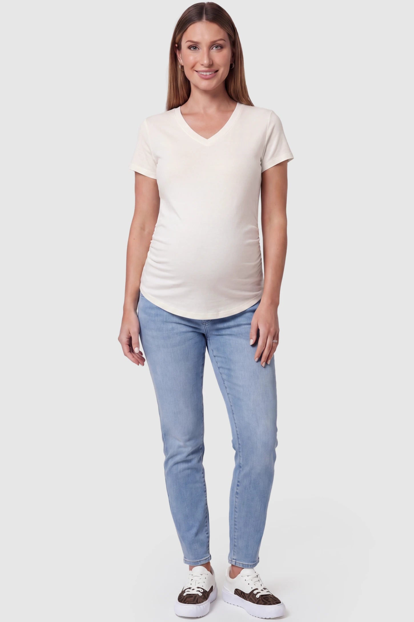 Side Ruched V-Neck Short Sleeve Maternity T-Shirt Side Ruched V-Neck Short Sleeve Maternity T-Shirt in White featuring breathable fabric and ruching on sides on a pregnant model, full body view.