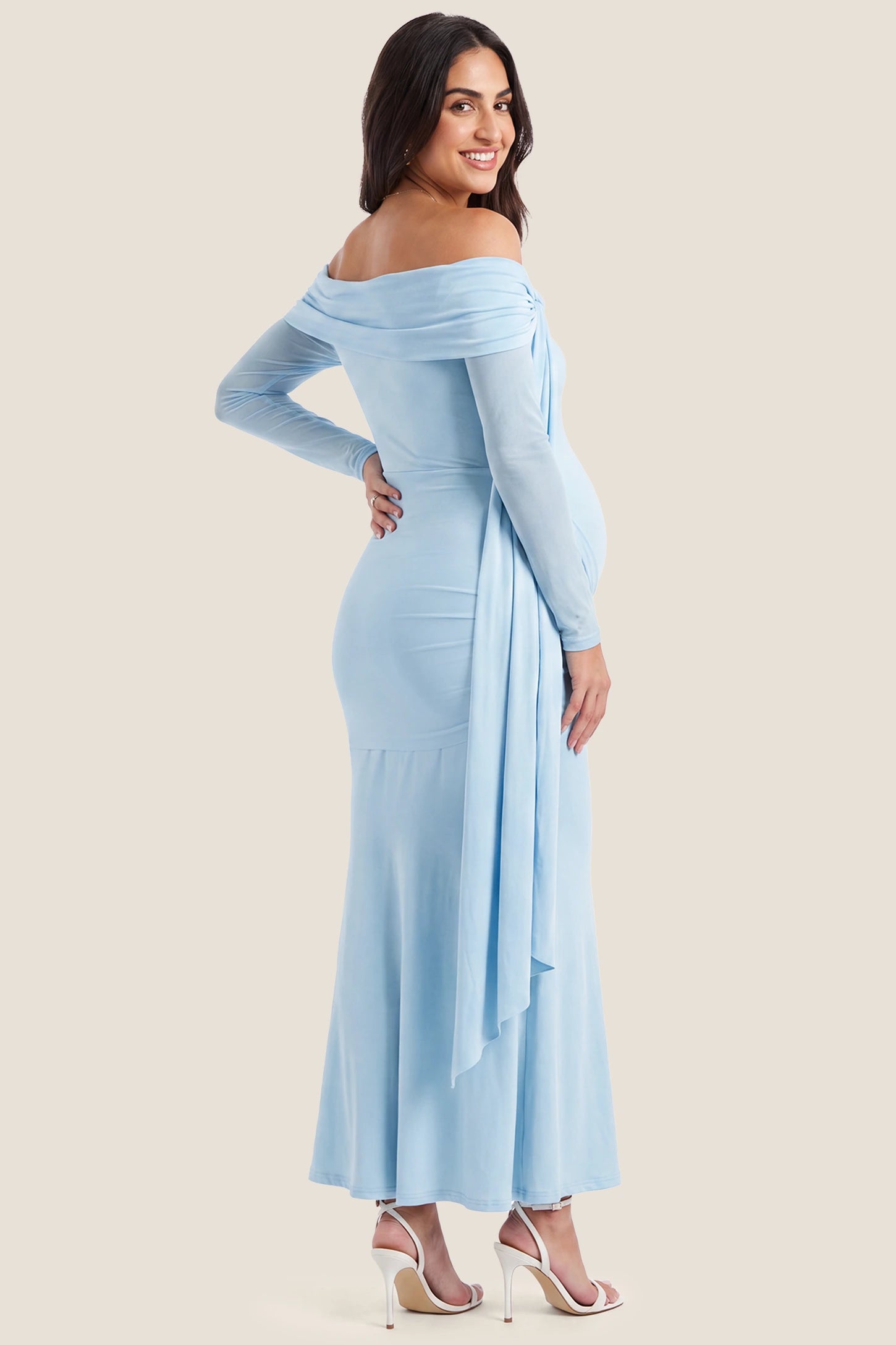 Side Tie Off-Shoulder Maxi Maternity Gown Side Tie Off-Shoulder Maxi Maternity Gown in Light Blue showcasing smooth stretch fabric, back view on a pregnant model.