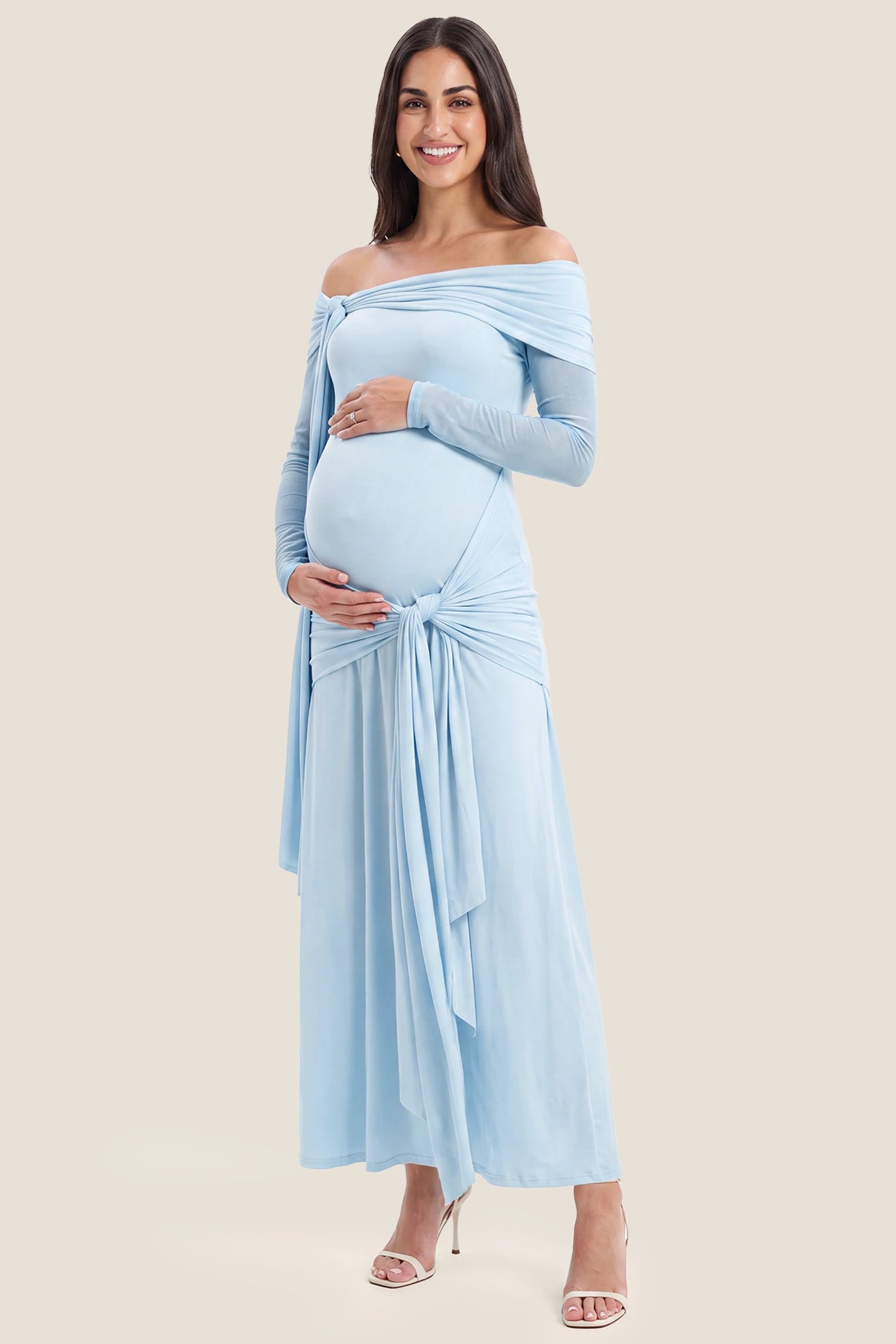 Side Tie Off-Shoulder Maxi Maternity Gown Side Tie Off-Shoulder Maxi Maternity Gown in Light Blue featuring a side knot detail, front view on a pregnant model.