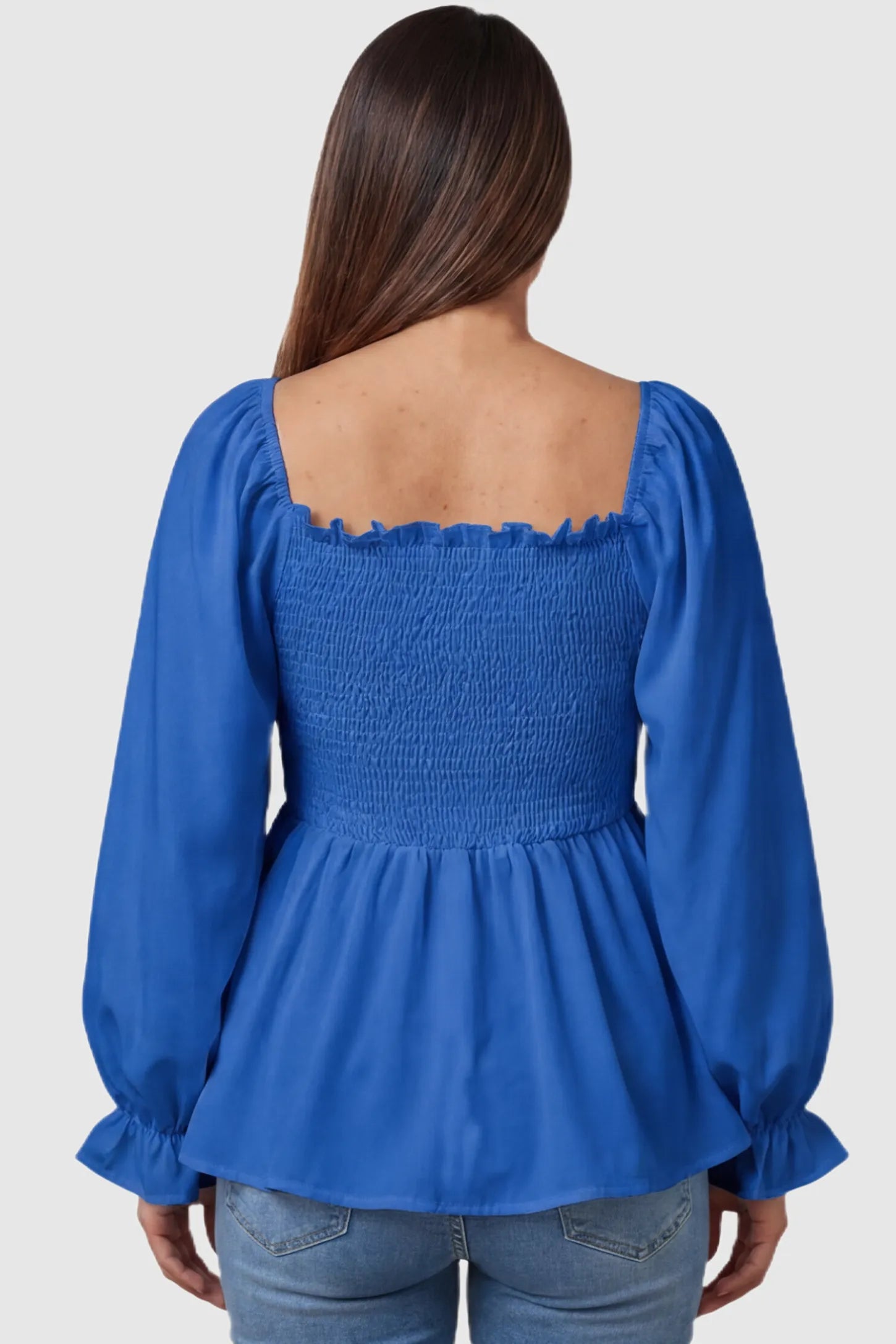 Smocked Convertible Neckline Bishop Sleeve Maternity Top Smocked Convertible Neckline Bishop Sleeve Maternity Top in Blue featuring a ruffled square back on a pregnant model back view.