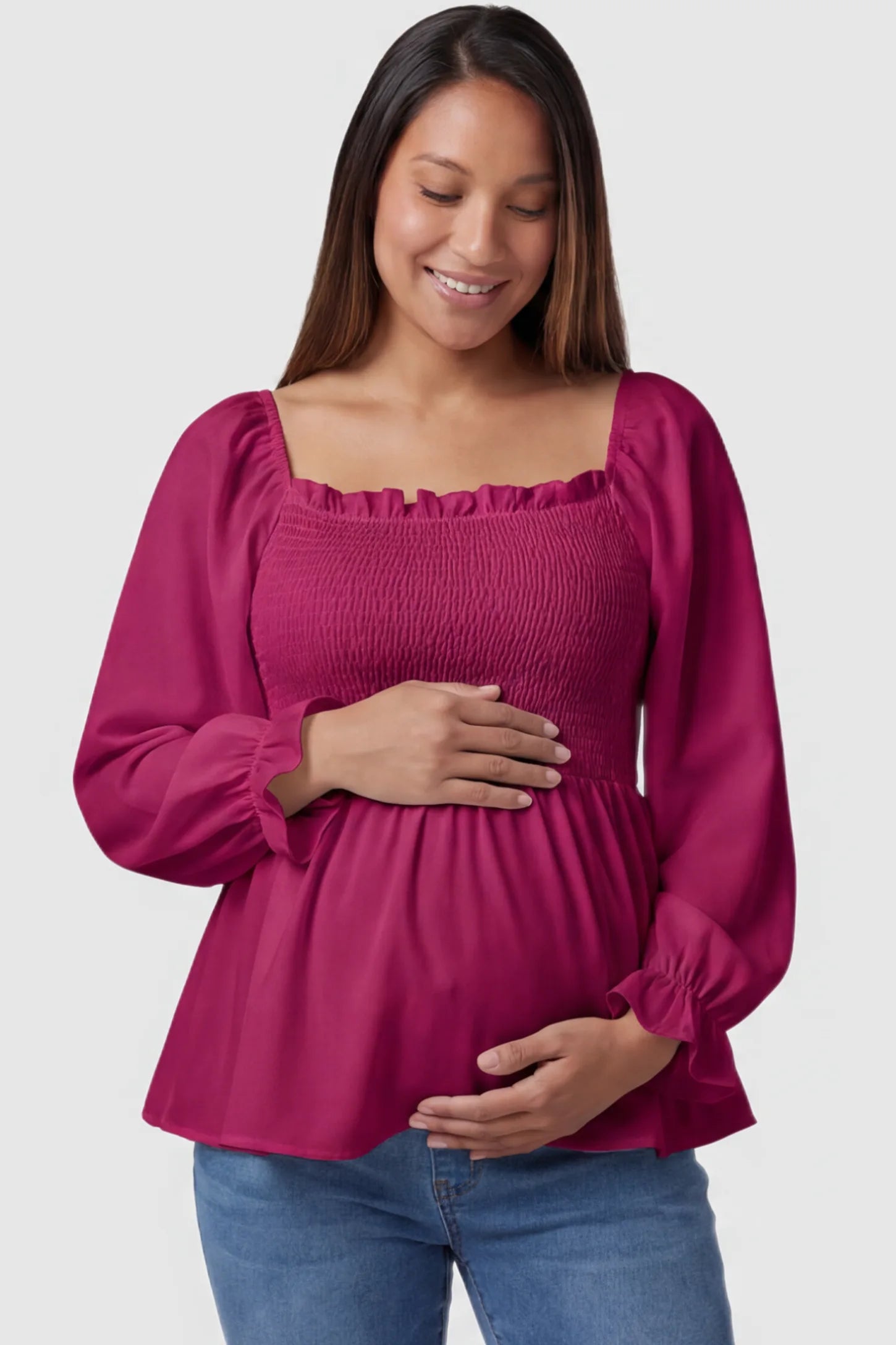 Smocked Convertible Neckline Bishop Sleeve Maternity Top Smocked Convertible Neckline Bishop Sleeve Maternity Top in Wine Red featuring a smocked bodice on a pregnant model front view.